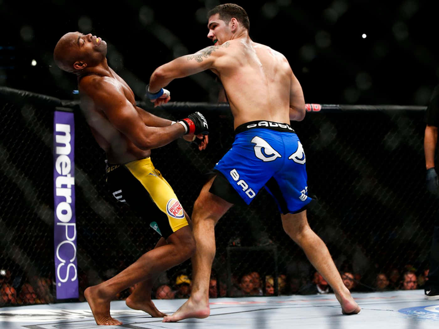 Chris Weidman Capturing Victory Over Anderson Silva Background