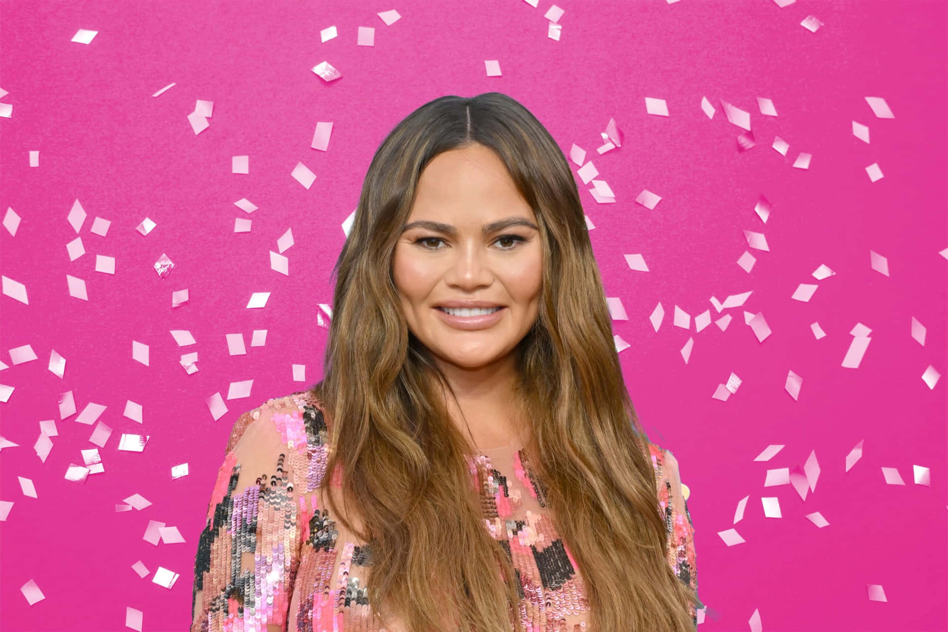 Chrissy Teigen Pink Backdrop Confetti Background