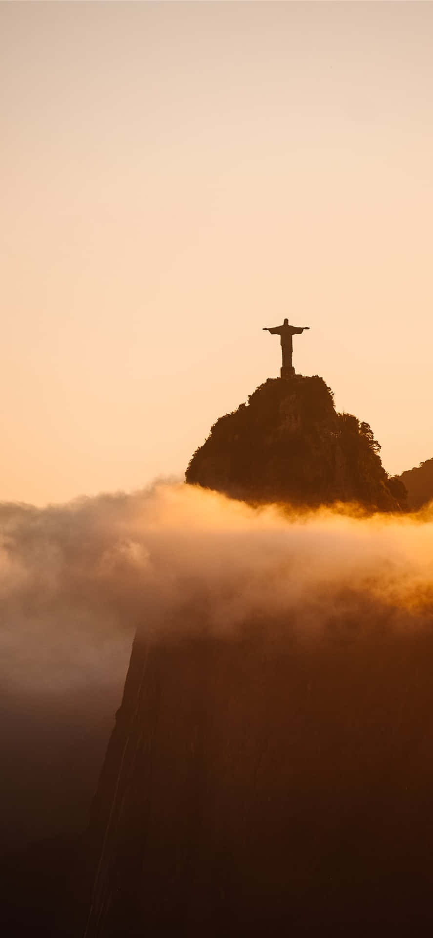 Christ The Redeemer Statue At Sunset In Rio De Janeiro, Brazil