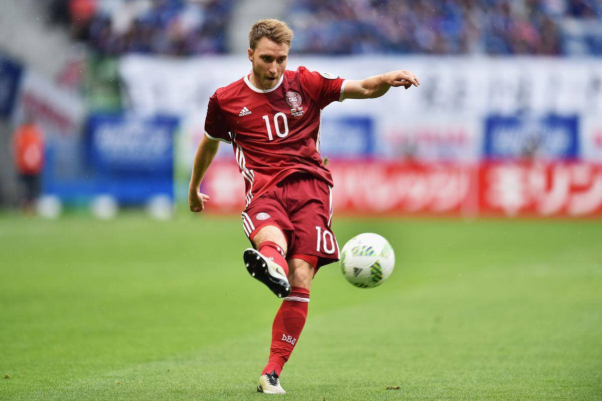 Christian Eriksen In Red Kicking The Ball