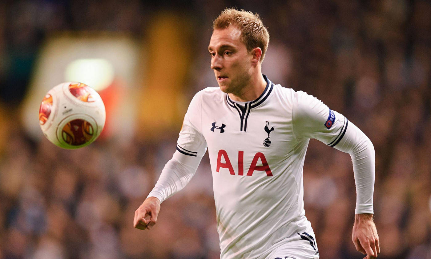 Christian Eriksen Kicking Ball Mid Air Background