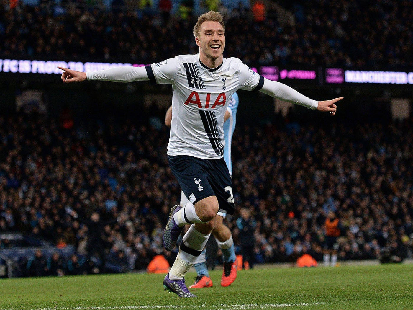 Christian Eriksen With Arms Outstretched Background