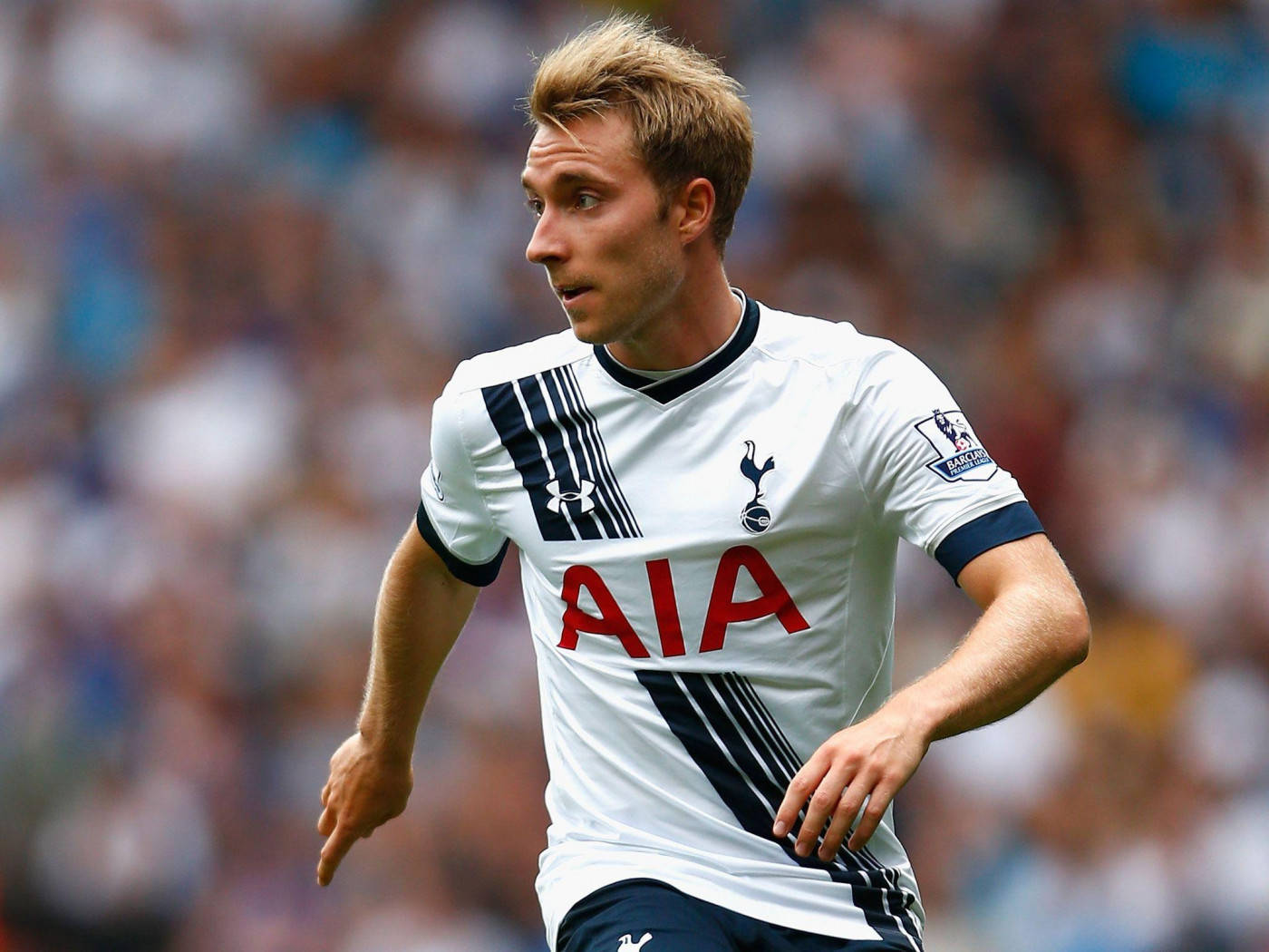 Christian Eriksen With Blurry Crowd In The Backdrop Background