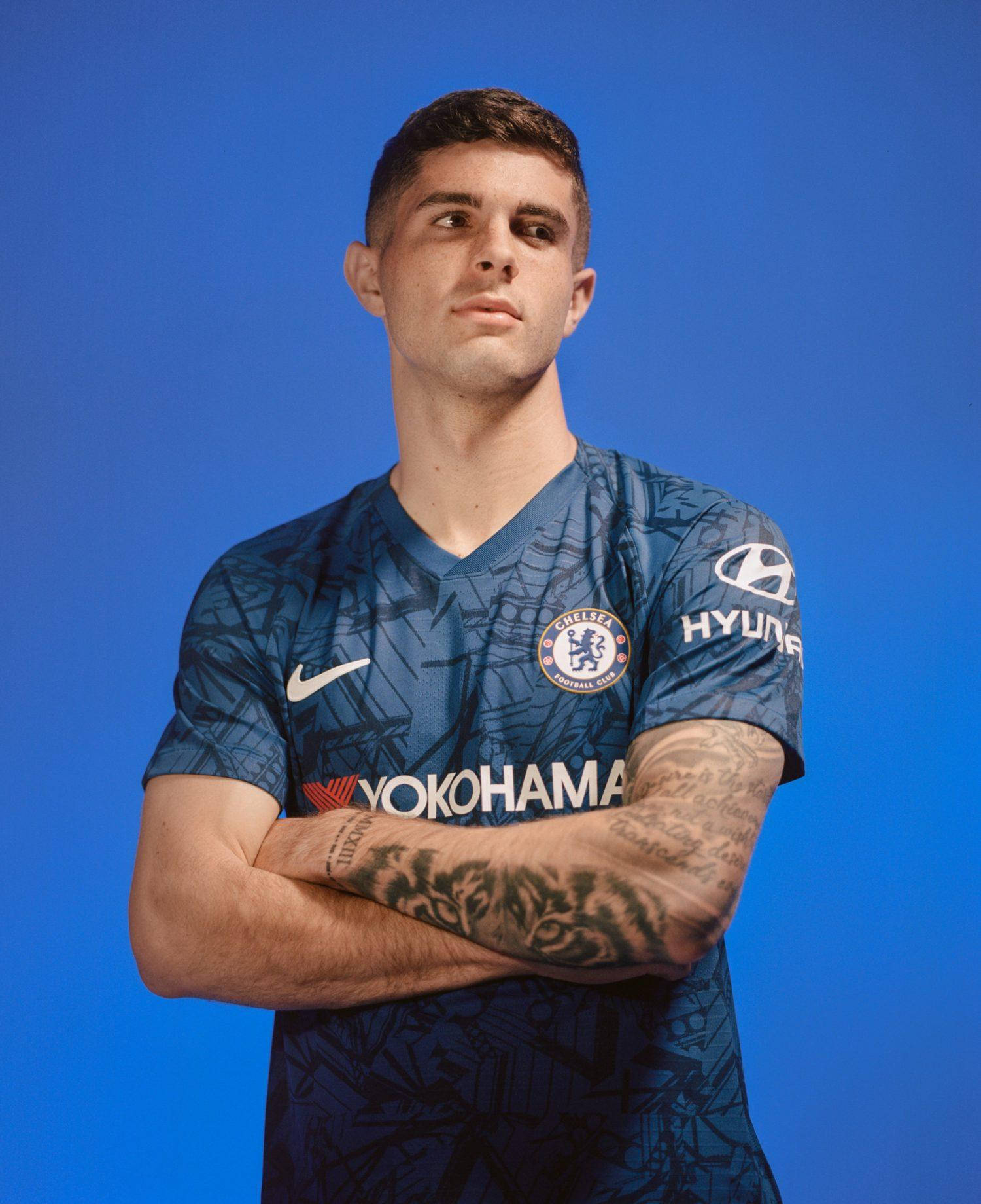 Christian Pulisic Crossed Arms Background