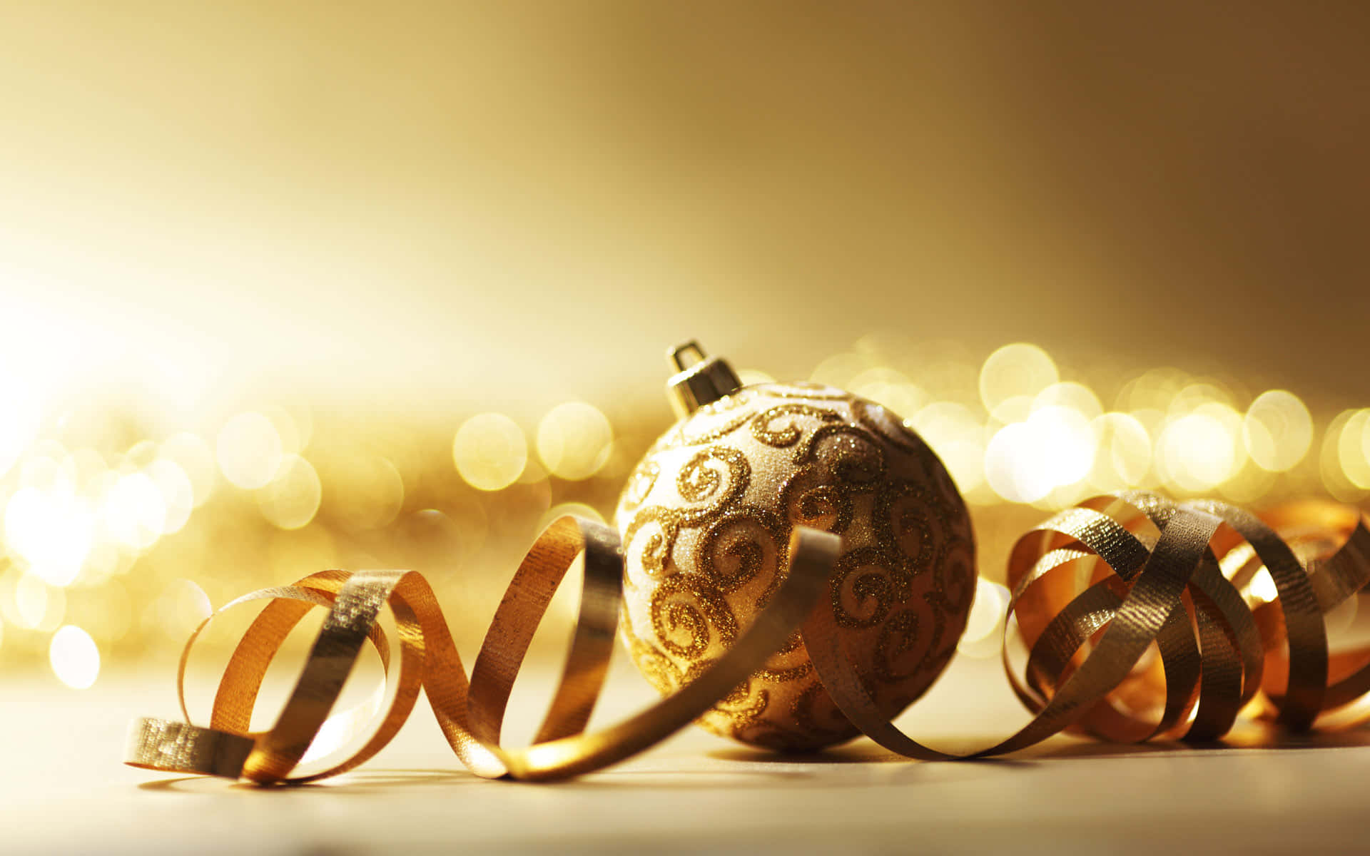 Christmas Ornaments And Ribbons On A Table Background