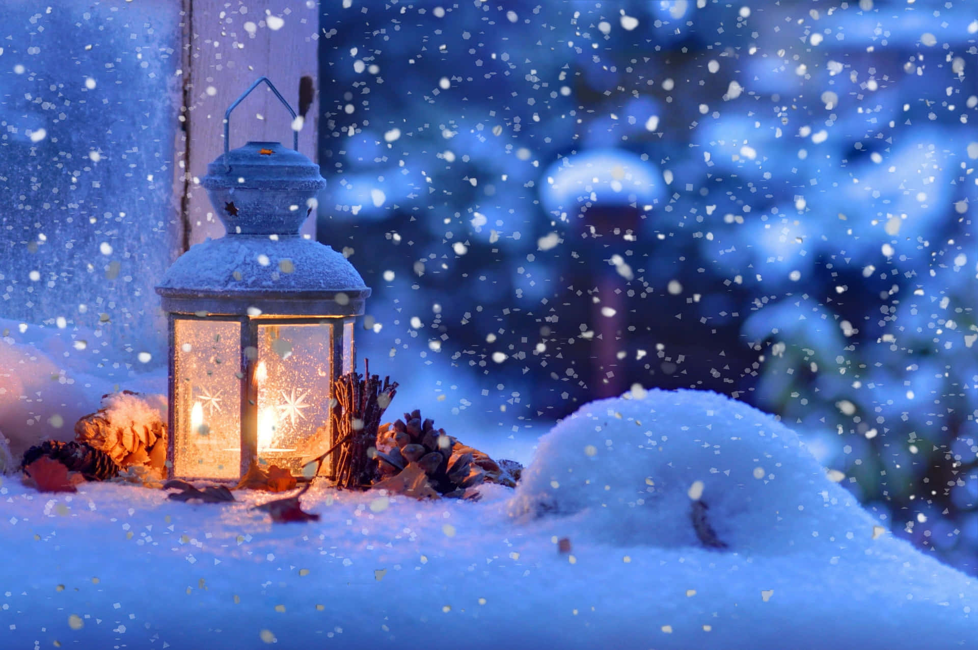 Christmas Snow Scene Lit Up By Warm Street Lights Background