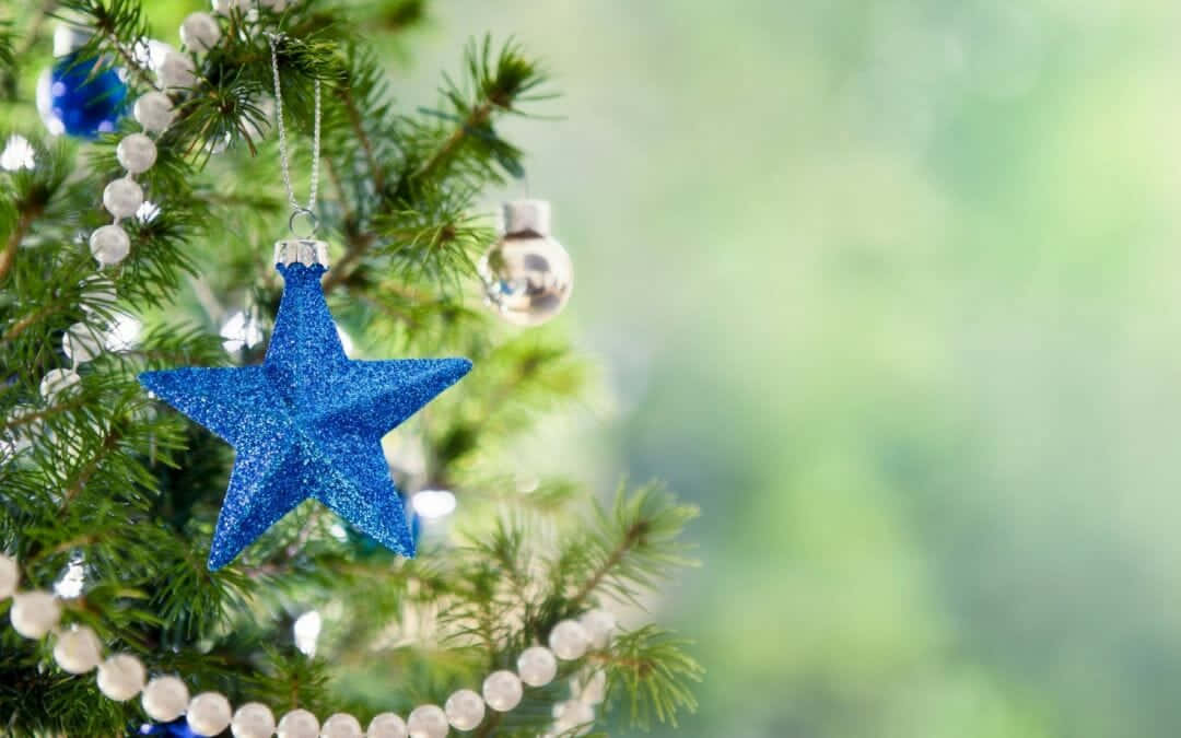 Christmas Tree With Blue Star Ornaments And Ornaments
