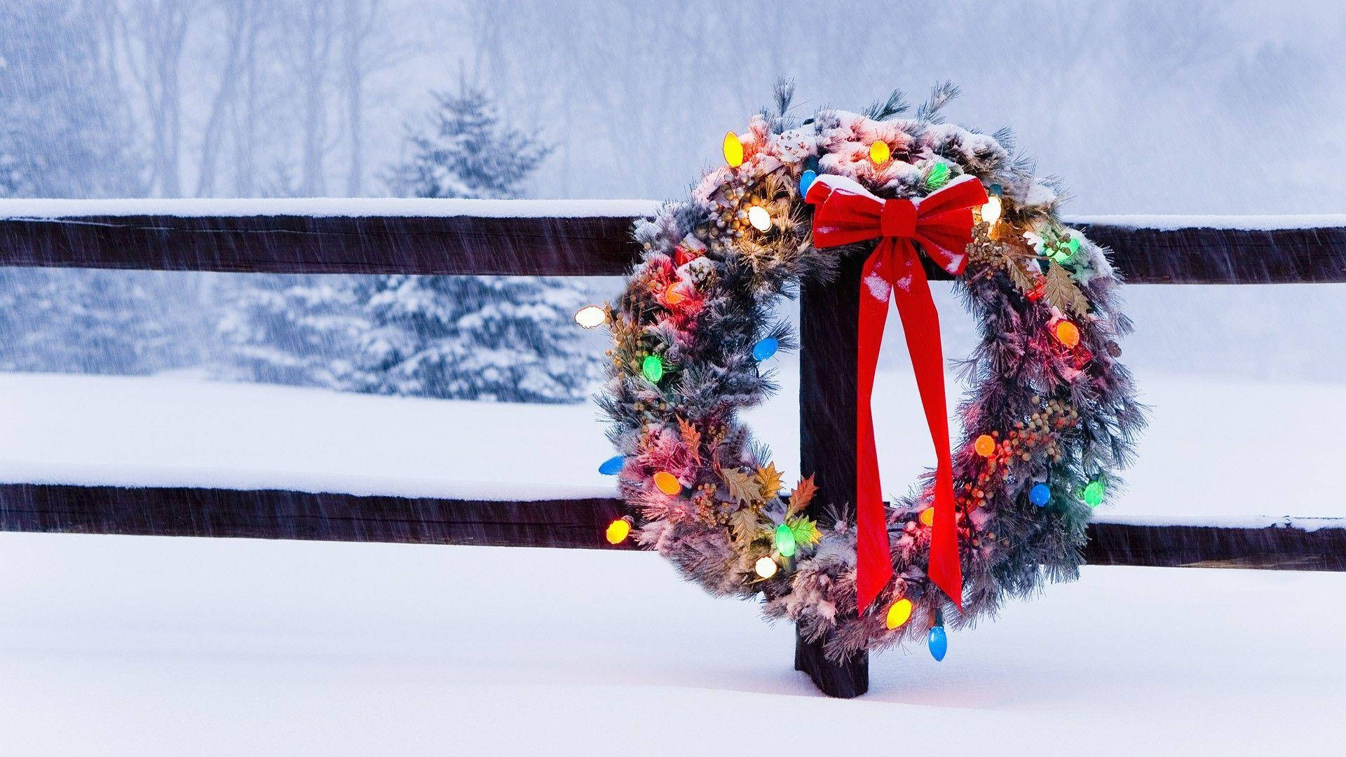 Christmas Wreath Covered In Snow Background