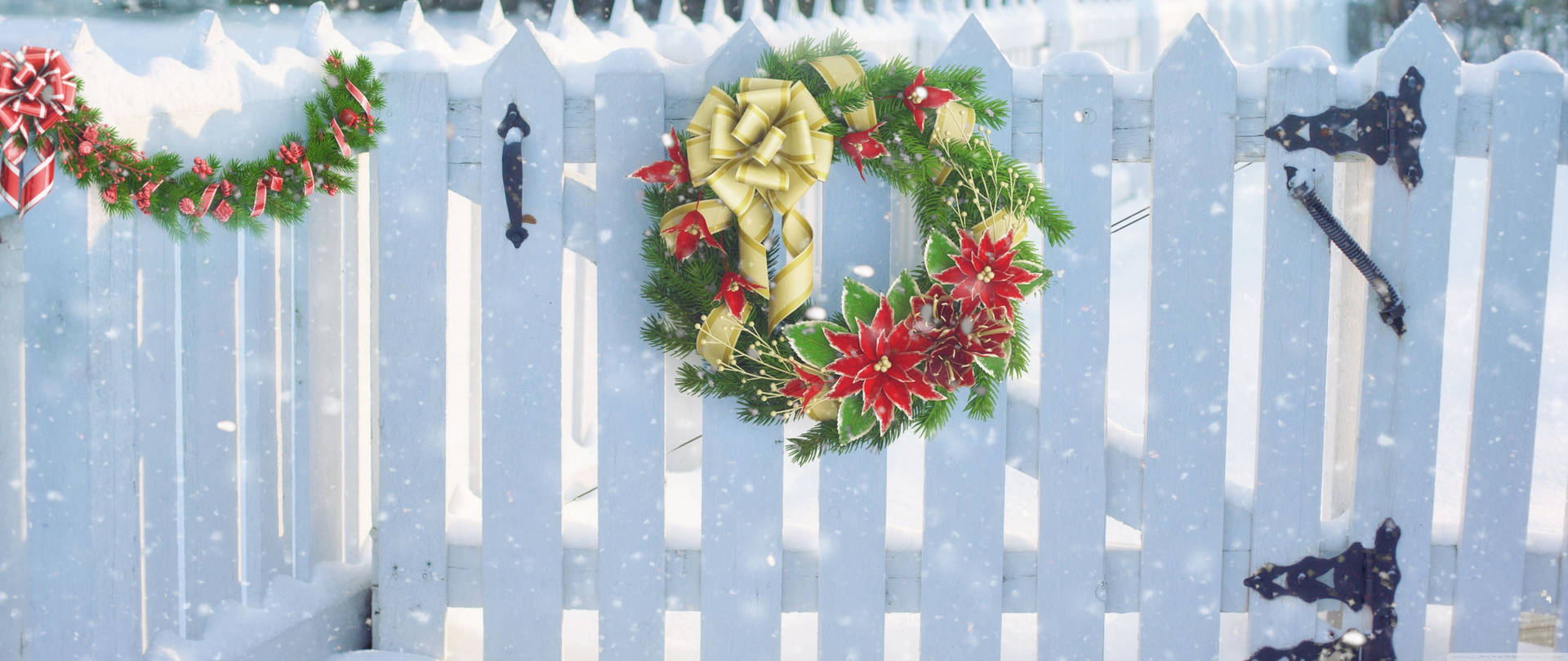 Christmas Wreath On A Fence Background