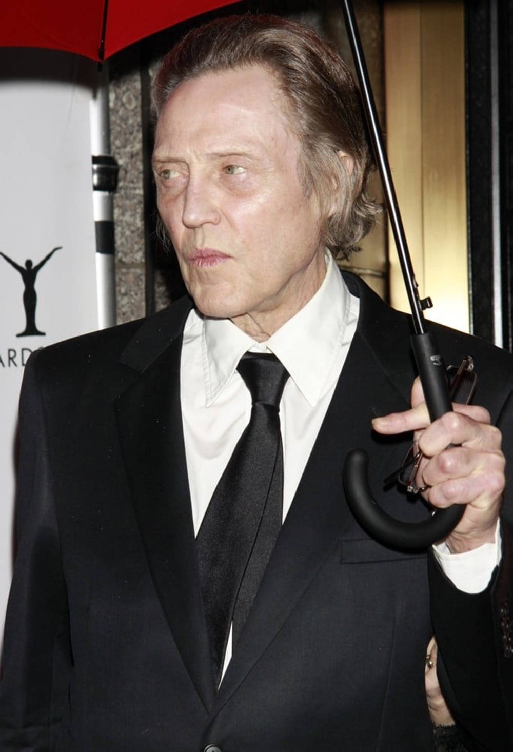 Christopher Walken Holding An Umbrella