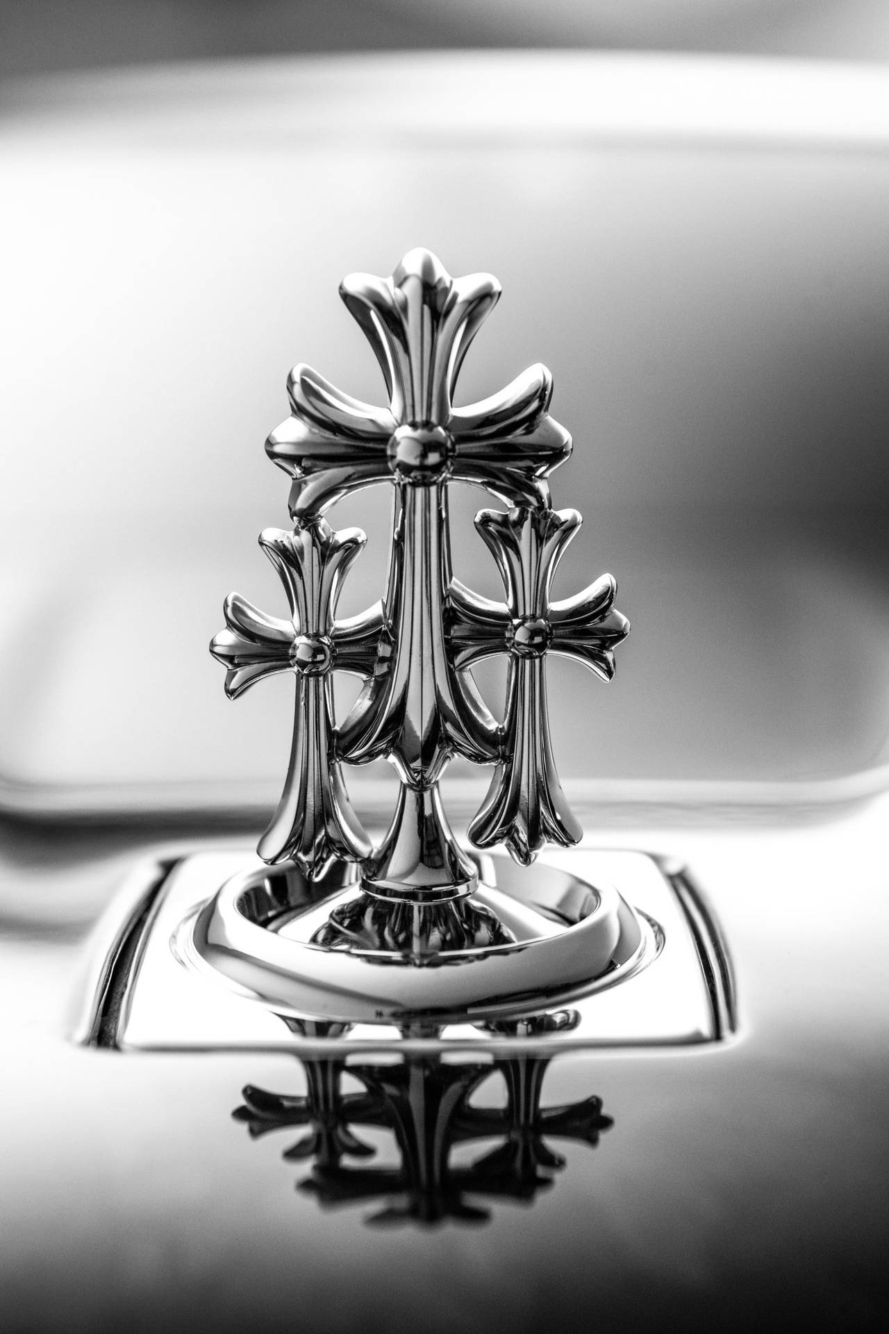 Chrome Hearts In Rolls Royce Background