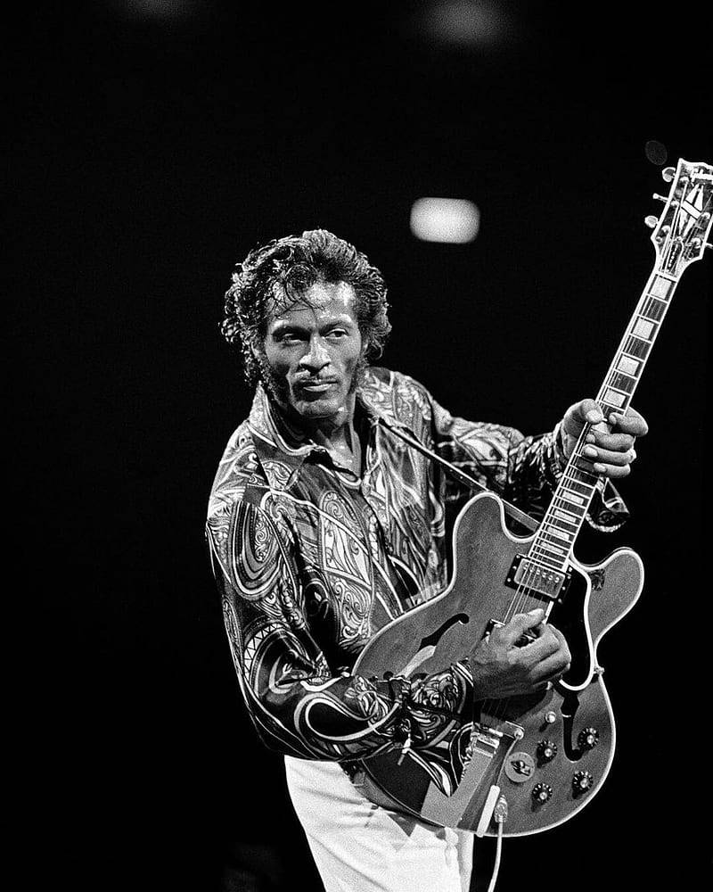 Chuck Berry Bending With Guitar Background