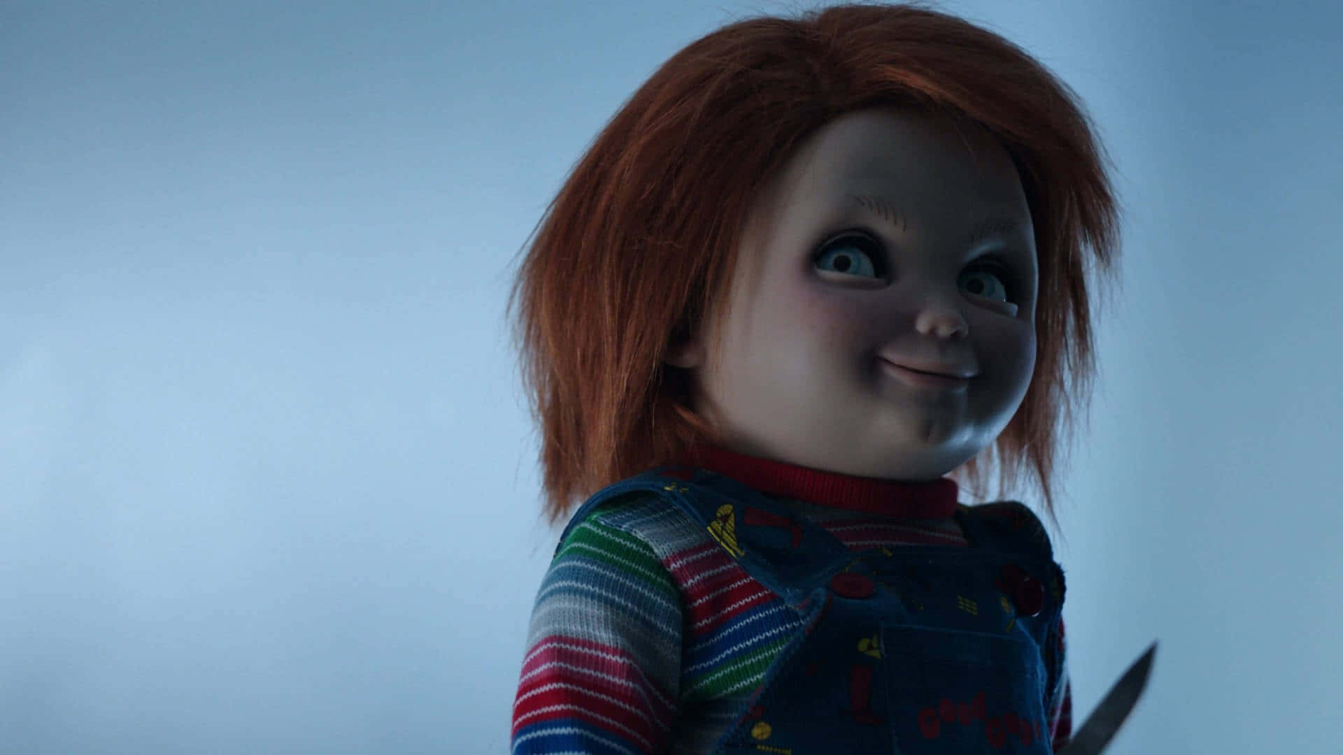 Chucky Doll Glancing To The Right Background