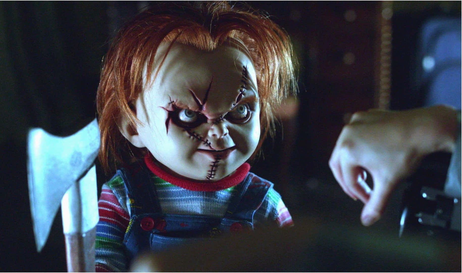 Chucky Doll Glaring At Someone Background