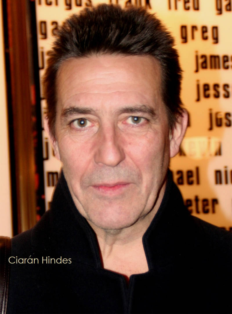 Ciarán Hinds Profile Suit Background