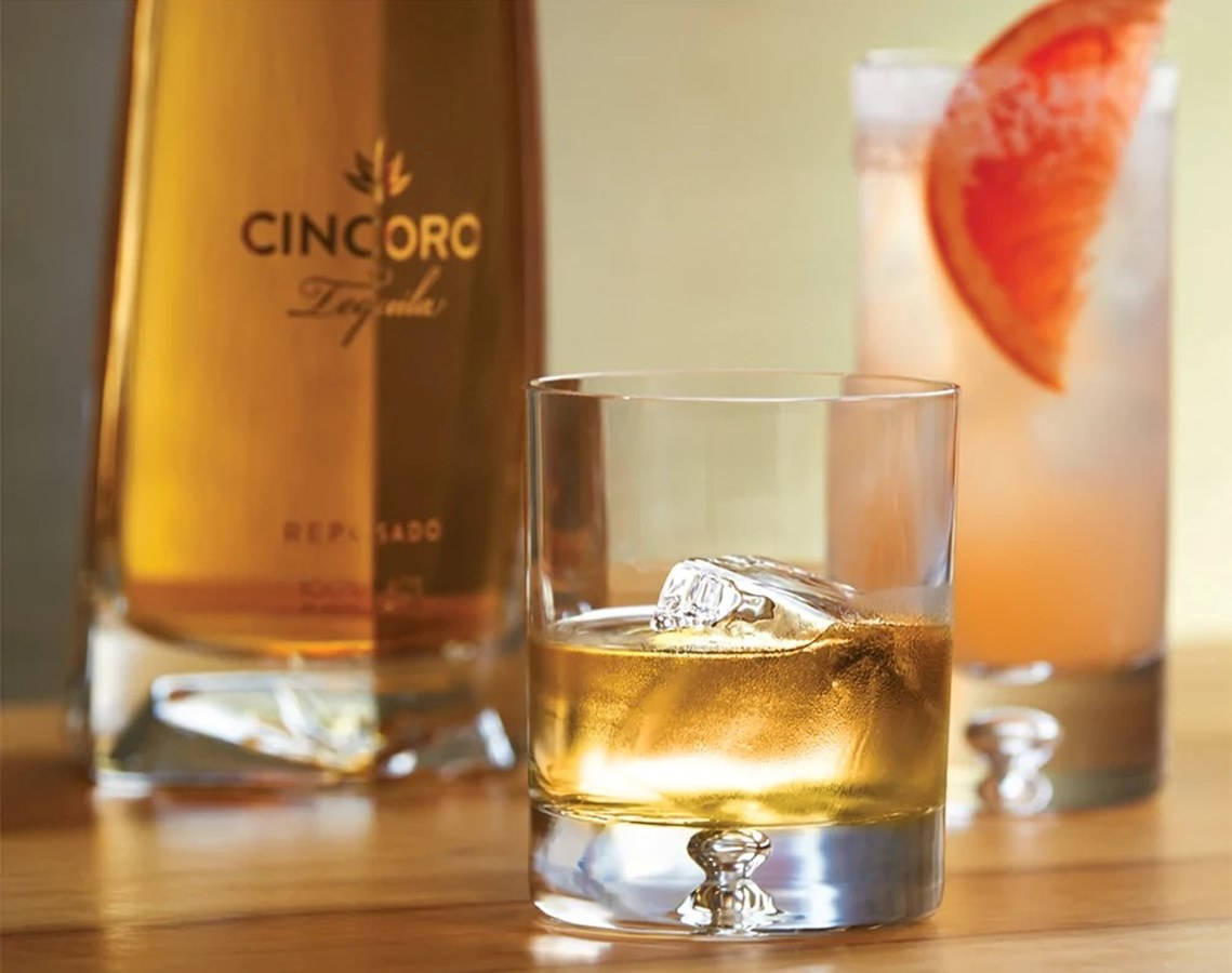 Cincoro Reposado Tequila Cocktail Against A Modern Backdrop Background