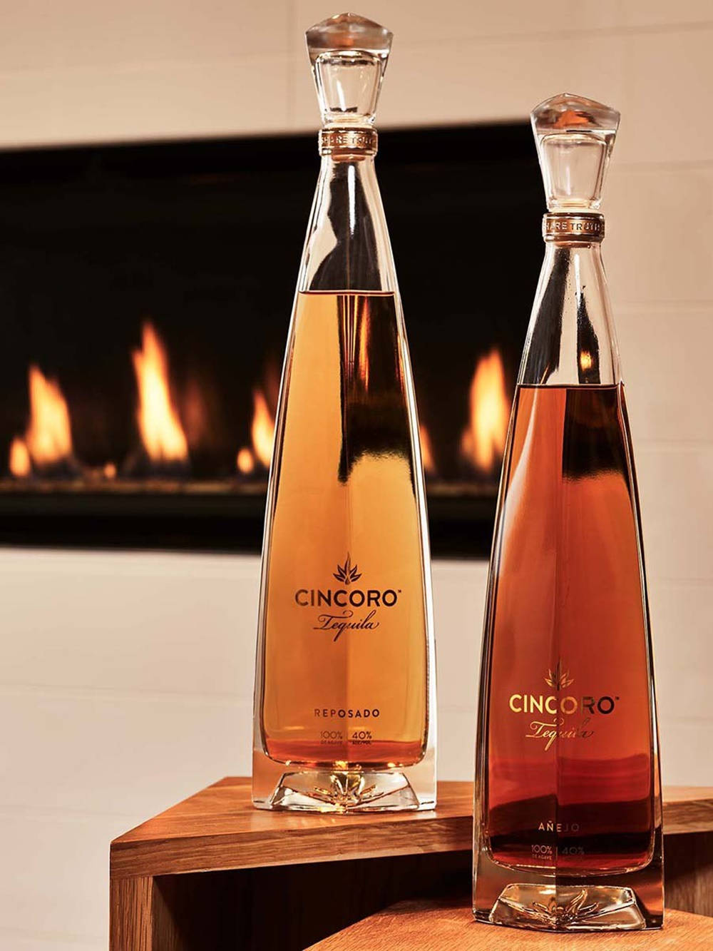 Cincoro Tequila Reposado And Añejo With Fire Display On Tv