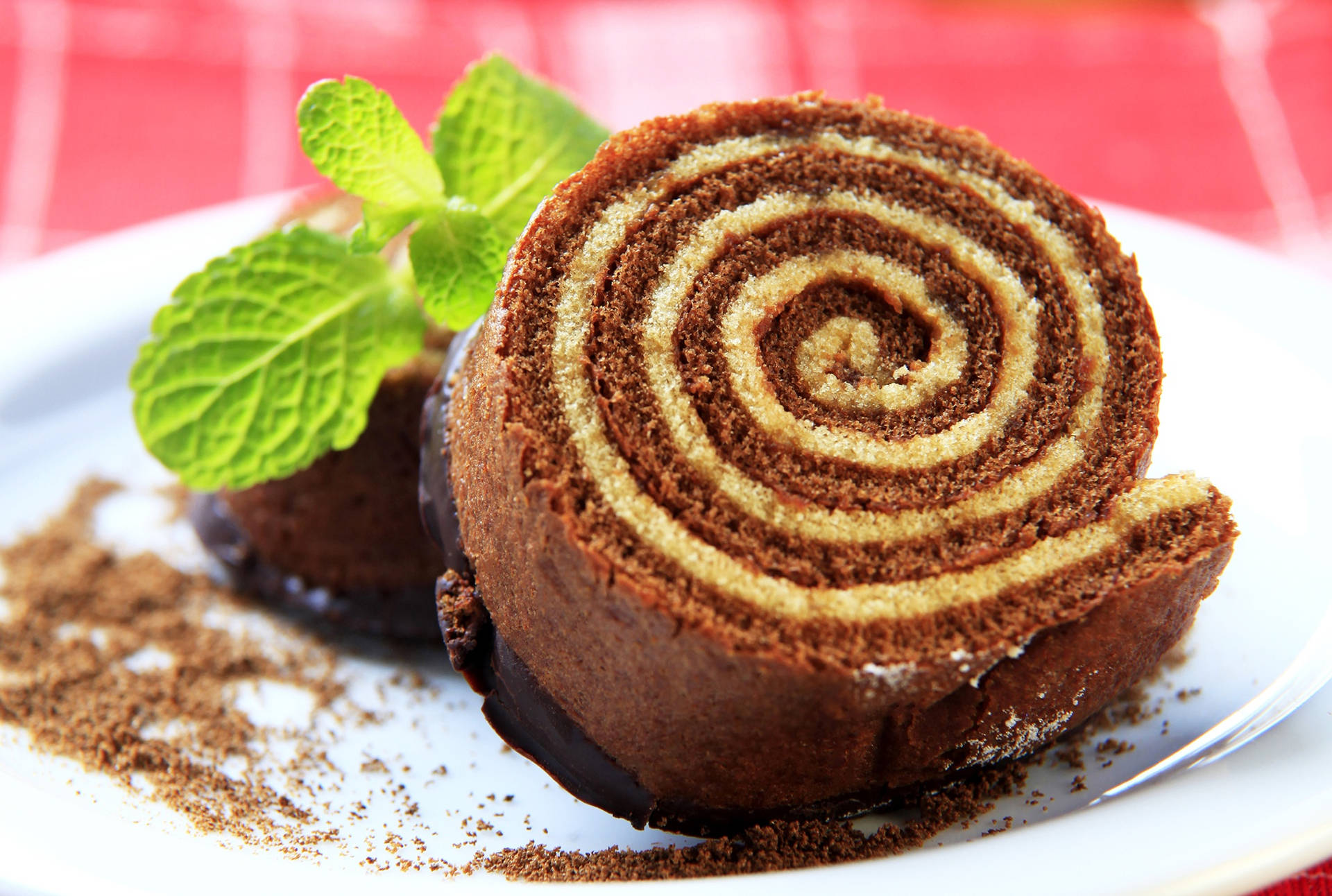 Cinnamon Pastries Roll With Leafy Garnish Background