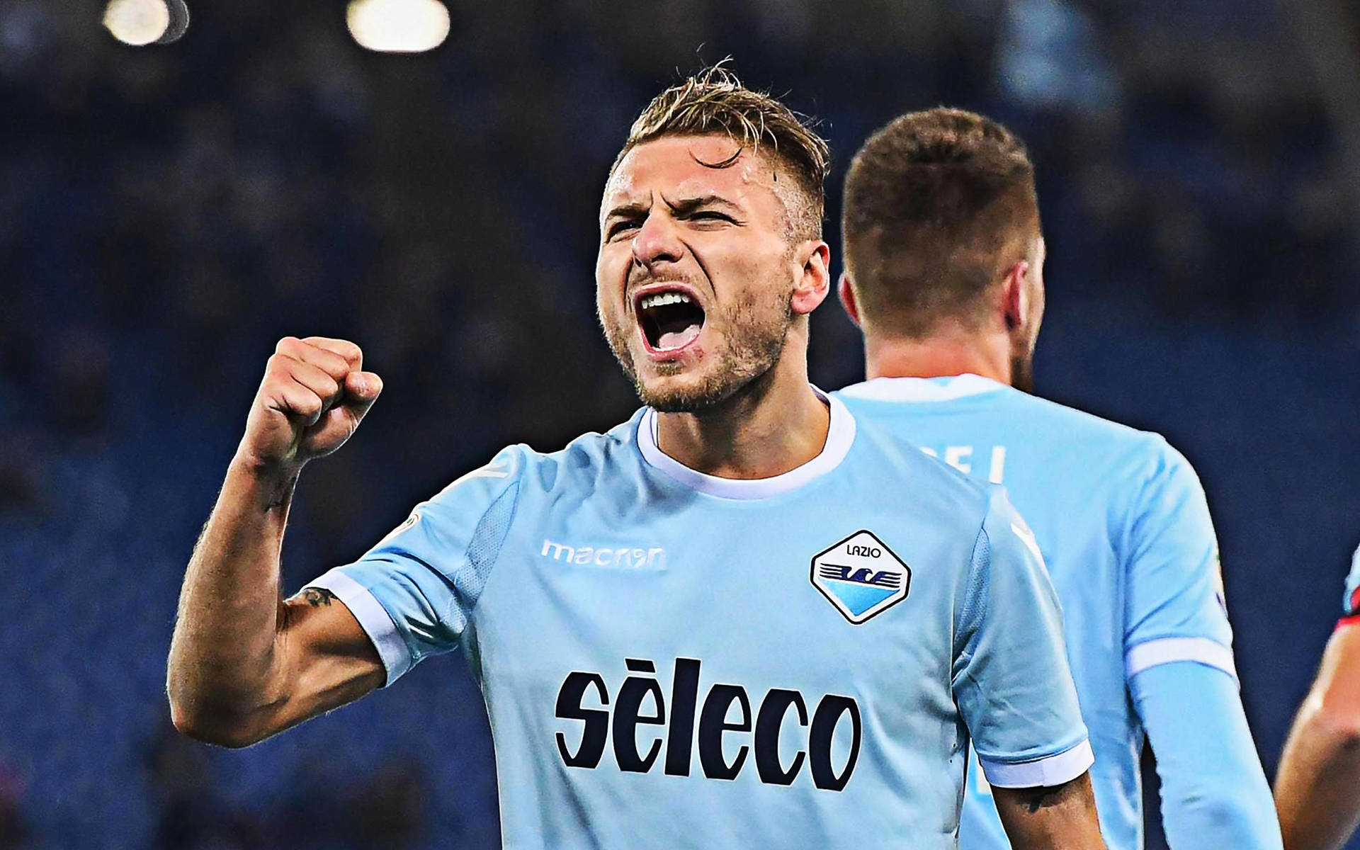 Ciro Immobile Celebrating Goal At Match Day Background