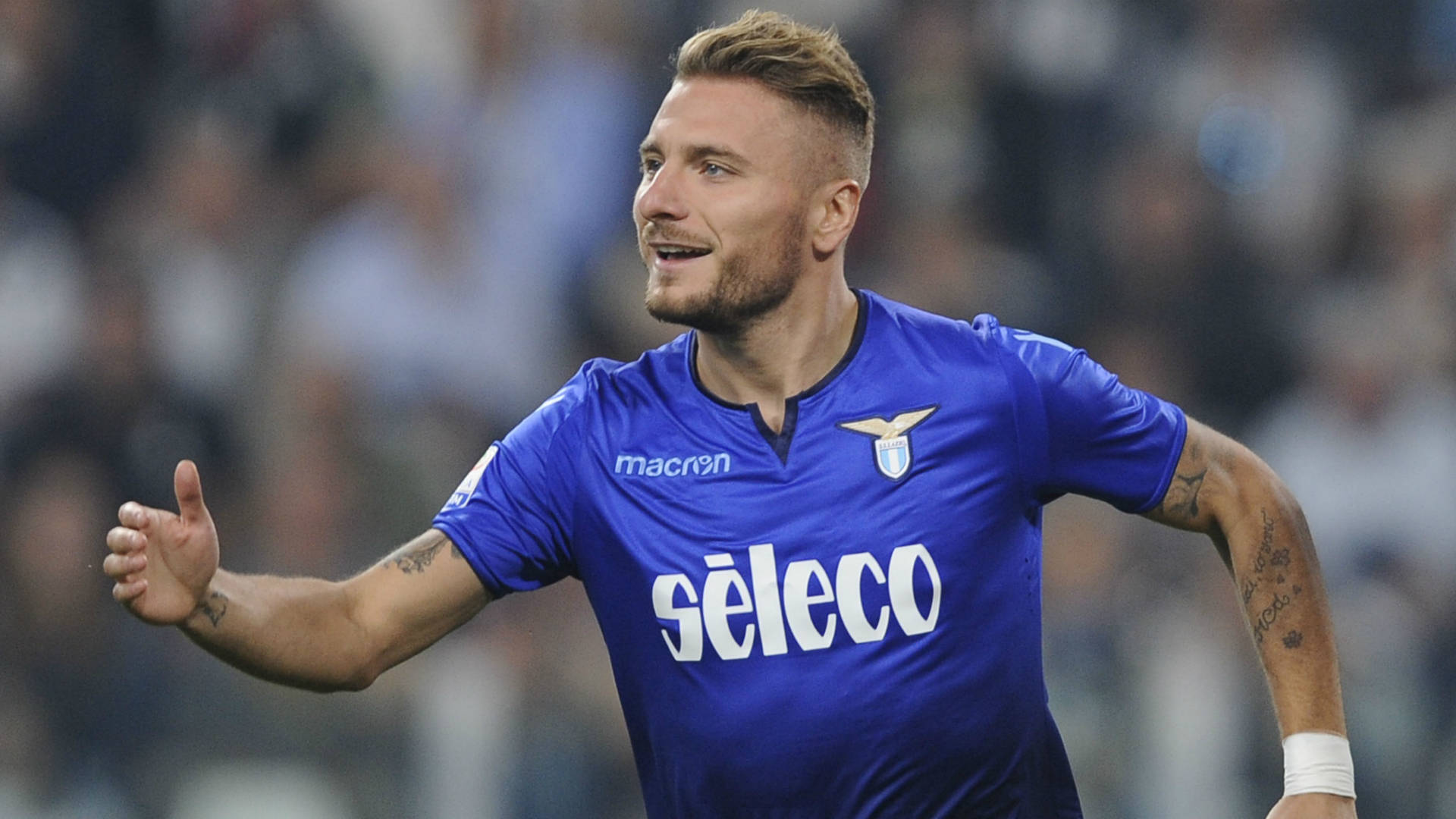 Ciro Immobile In Action On The Soccer Field Background