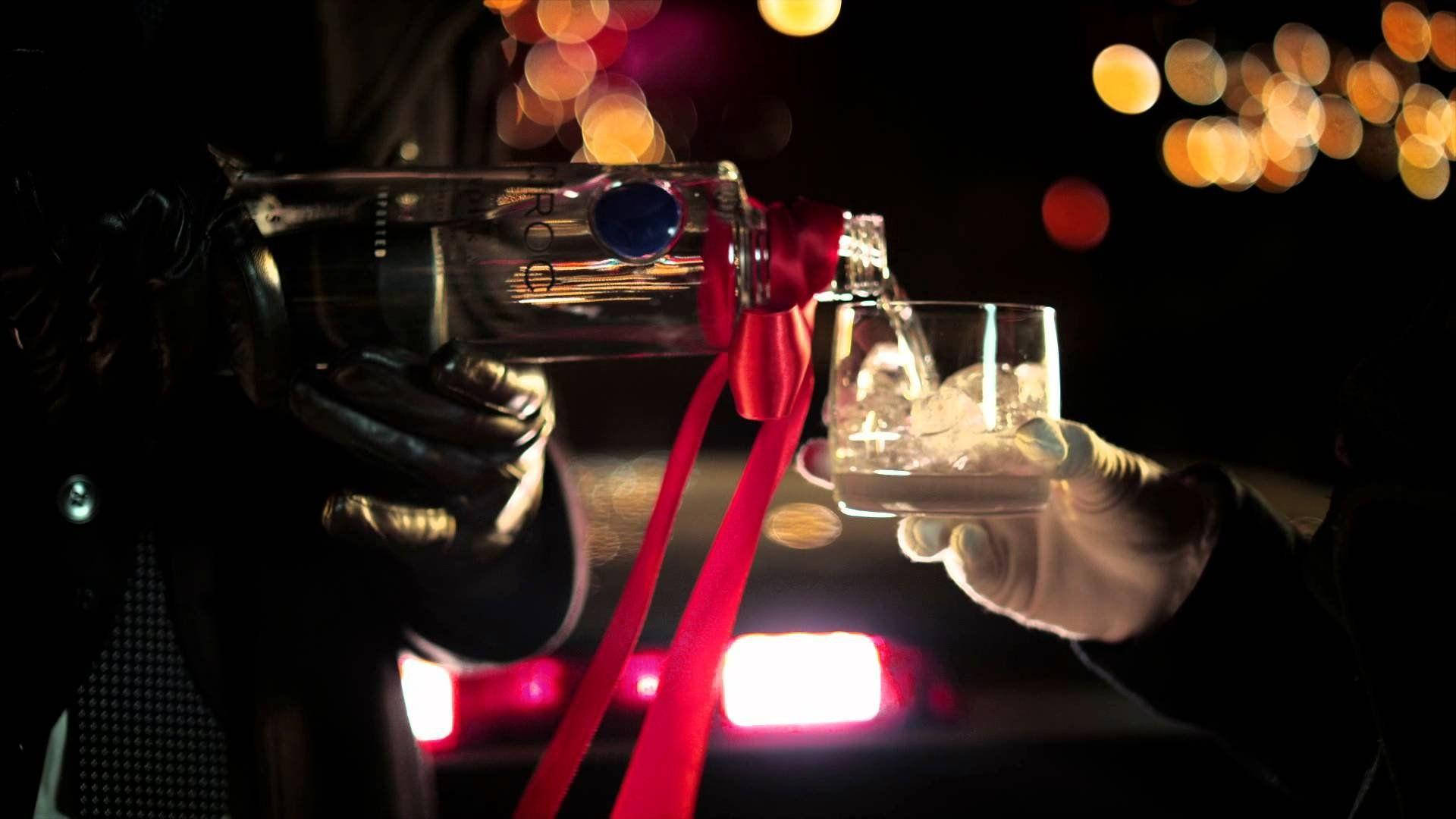 Ciroc French Vodka Bottle Poured On Glass Background