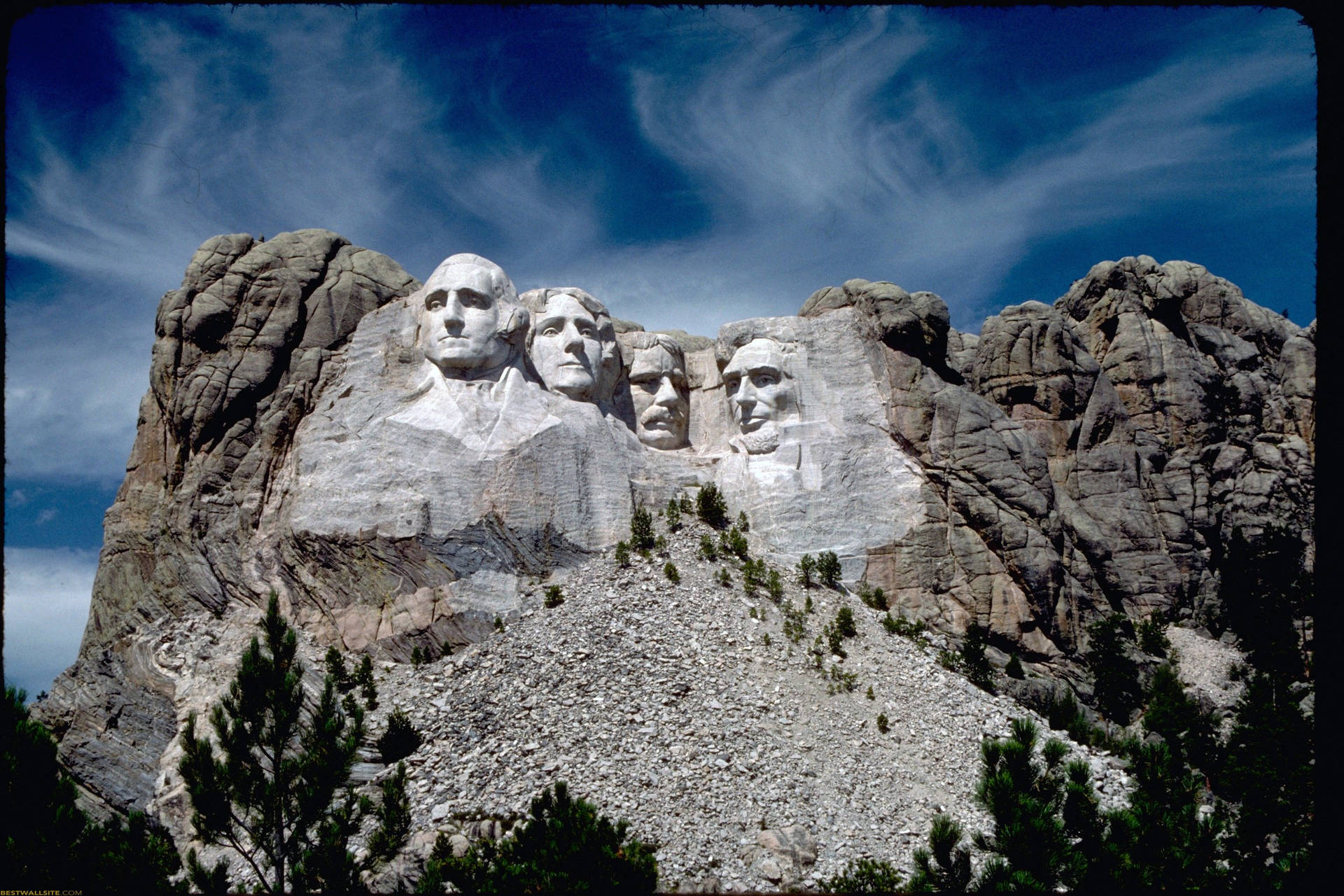 Cirrus Clouds On Mount Rushmore Background