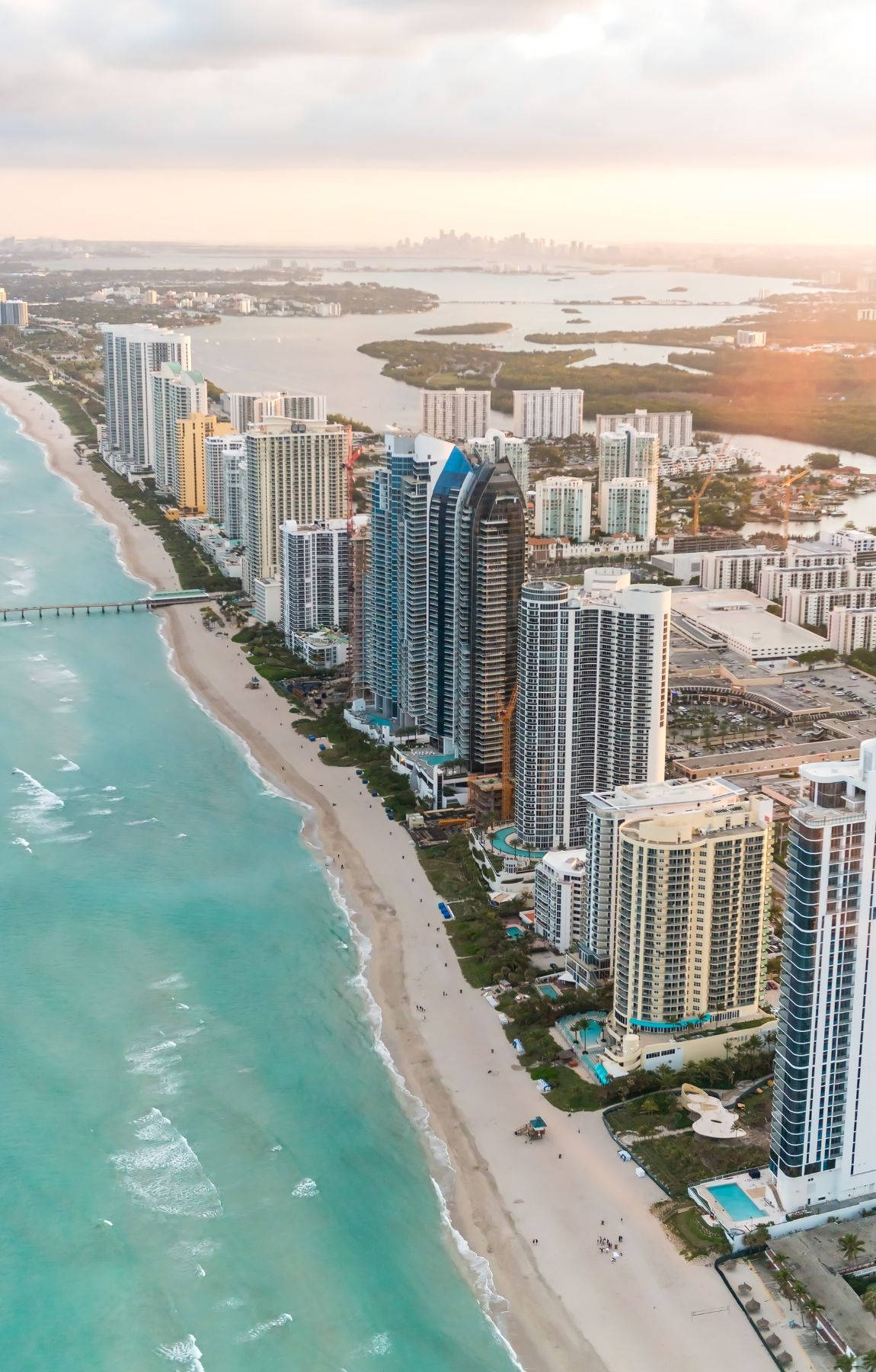 City Beach Sunrise Aerial Shot Background