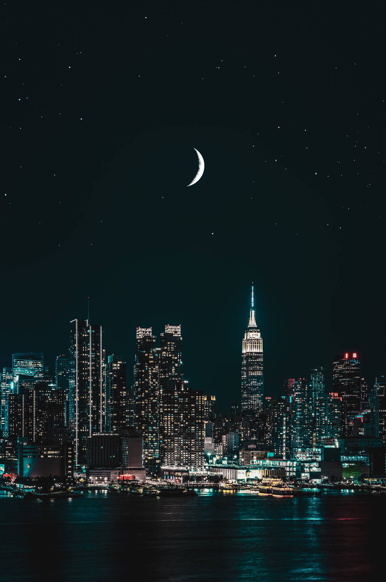 City Lights And Crescent Moon Background