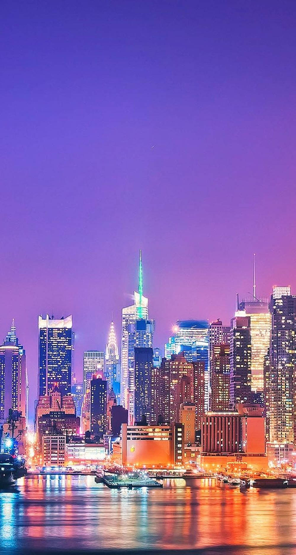 City Lights And Purple Sky Dazzling Nyc Phone Background