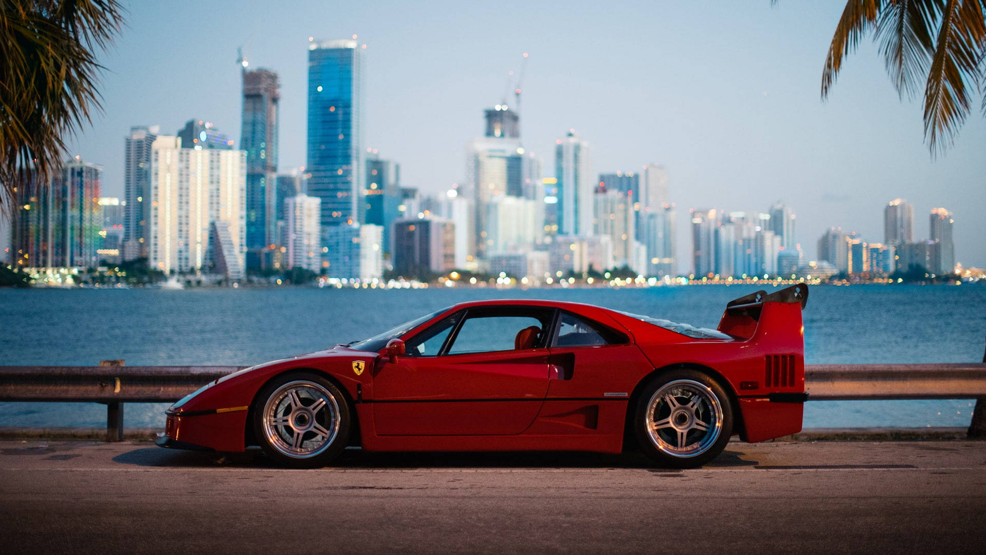 Cityscapes And Red Ferrari Ipad Background