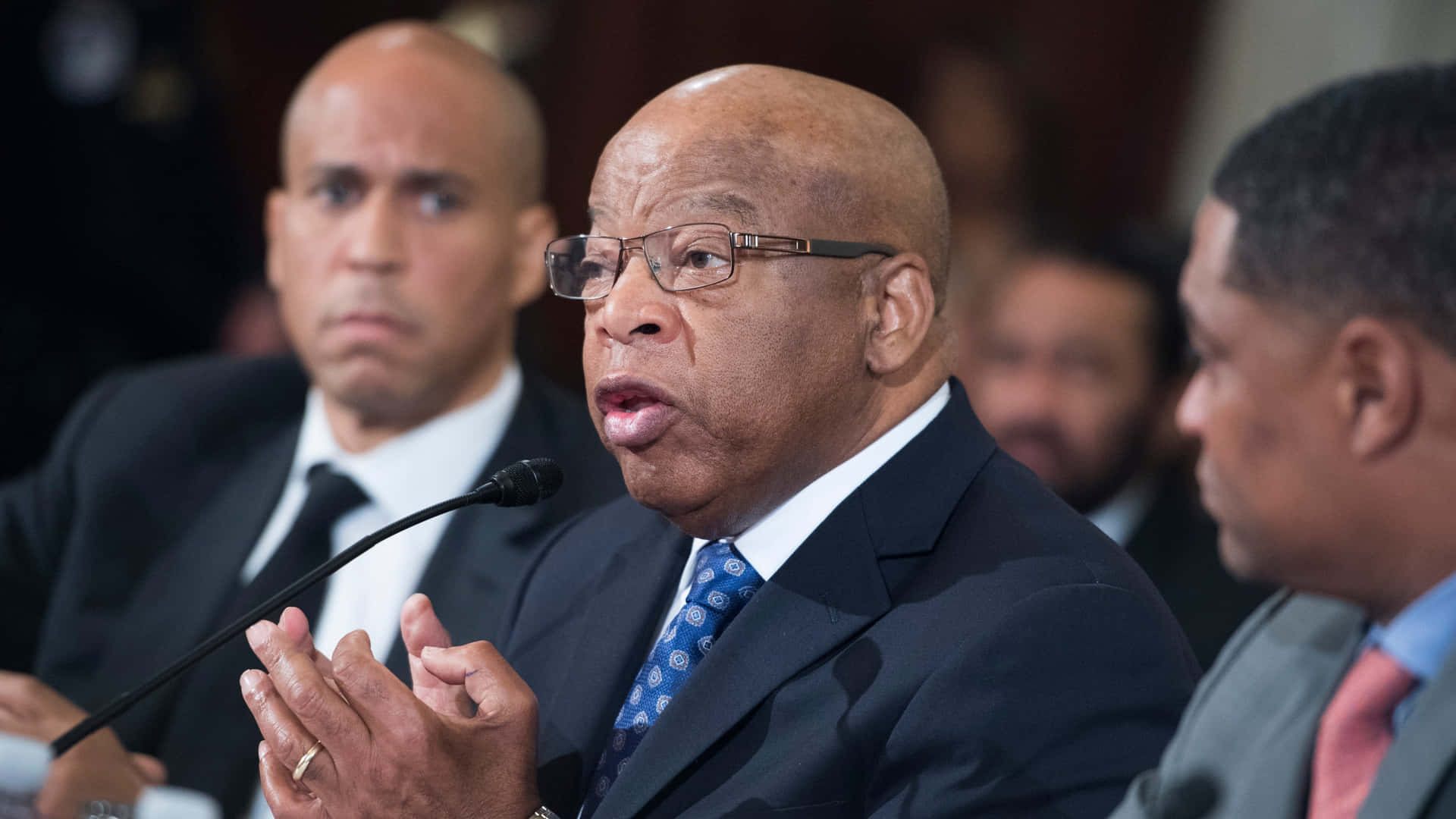 Civil Rights Icon John Lewis In Glasses Background