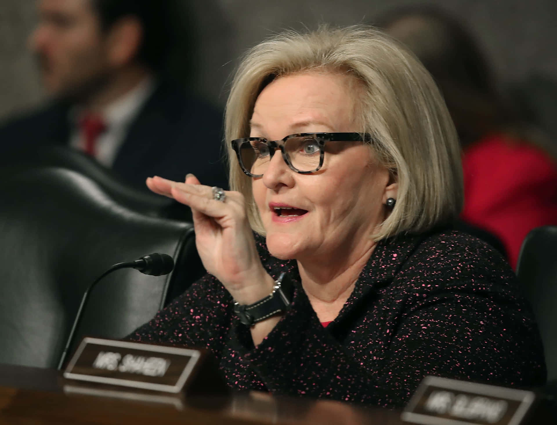 Claire Mccaskill Engaged In A Discussion With A Witness Background
