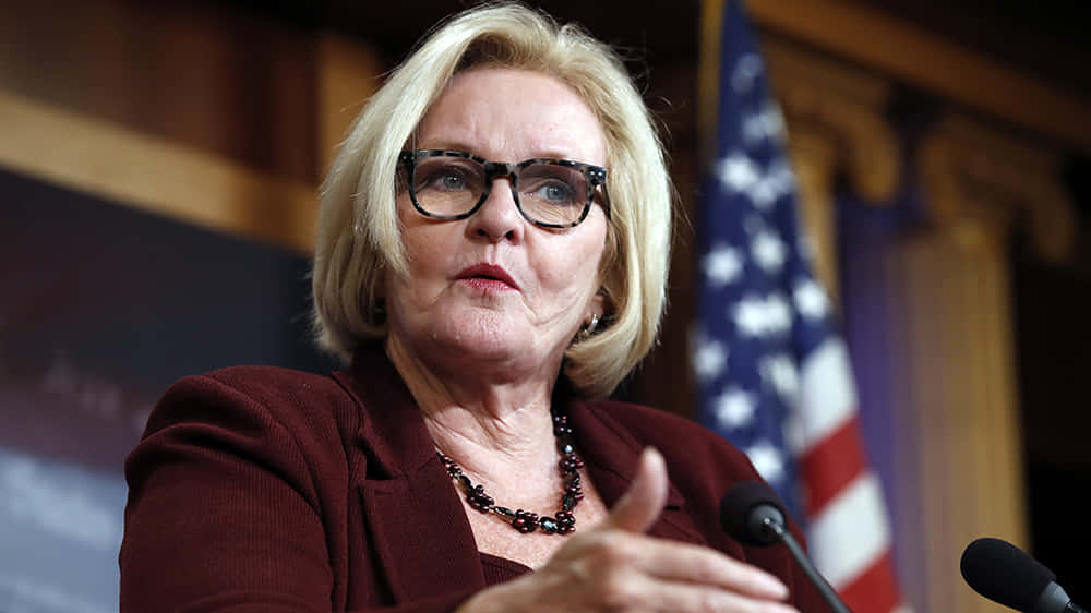 Claire Mccaskill Expressing Doubts In A Political Discussion Background