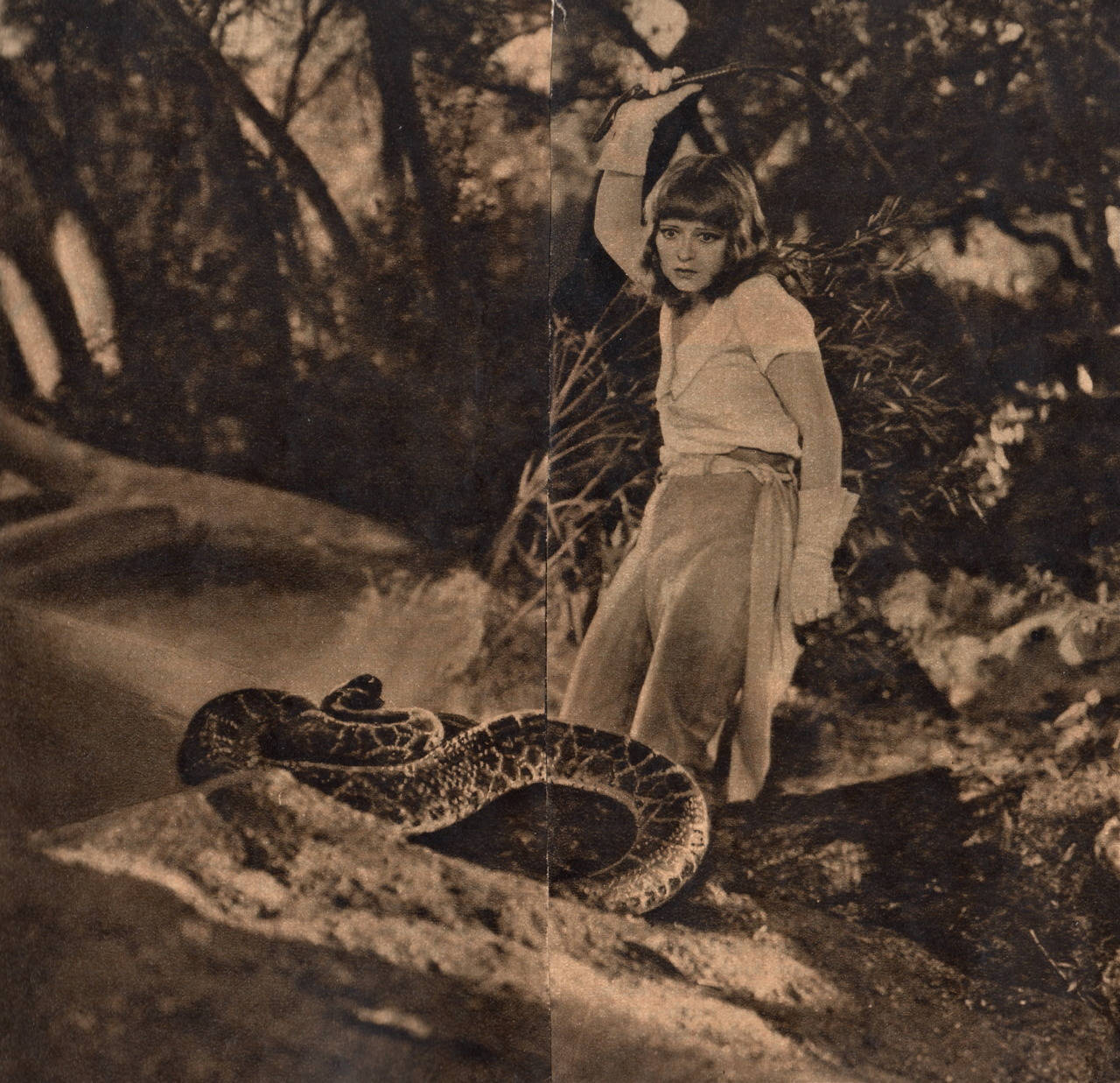Clara Bow Enthralling With A Giant Snake