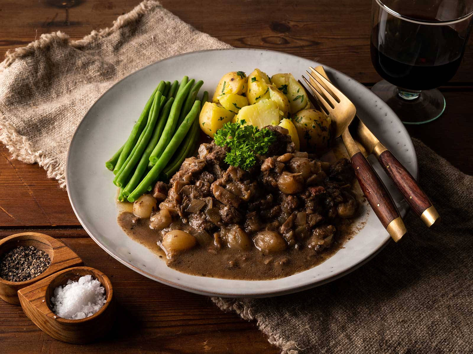 Classic Beef Bourguignon With Potato And Beans Background