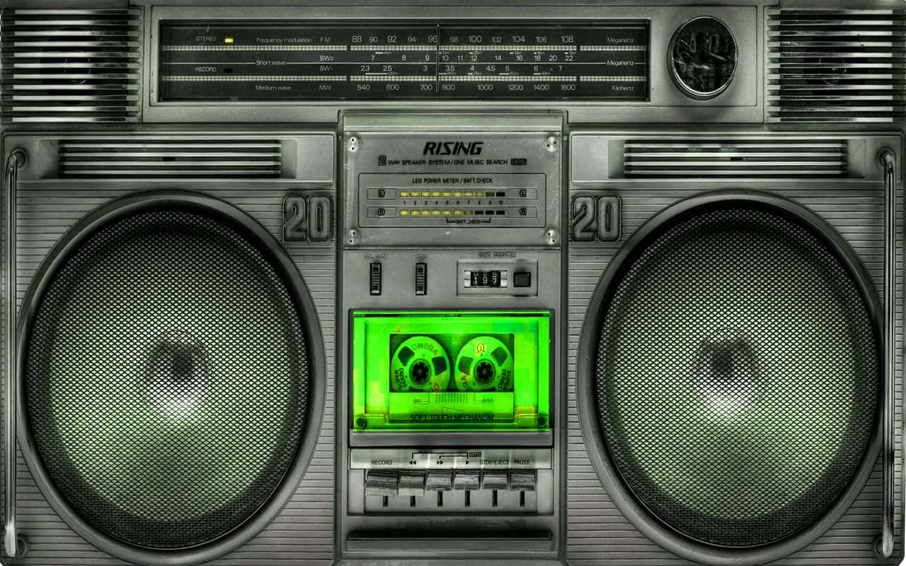 Classic Boombox And Green Cassette Background
