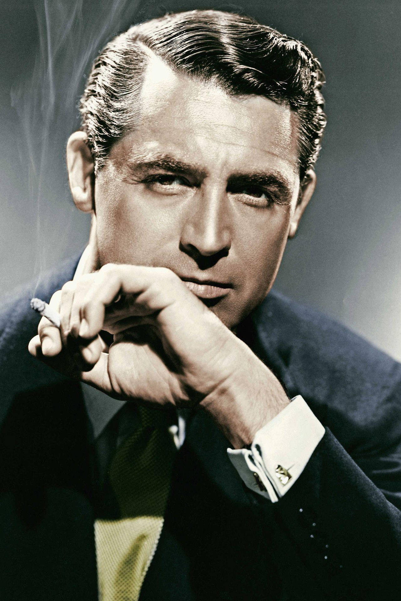 Classic Hollywood Star, Cary Grant, Captured In A Relaxed Moment Background