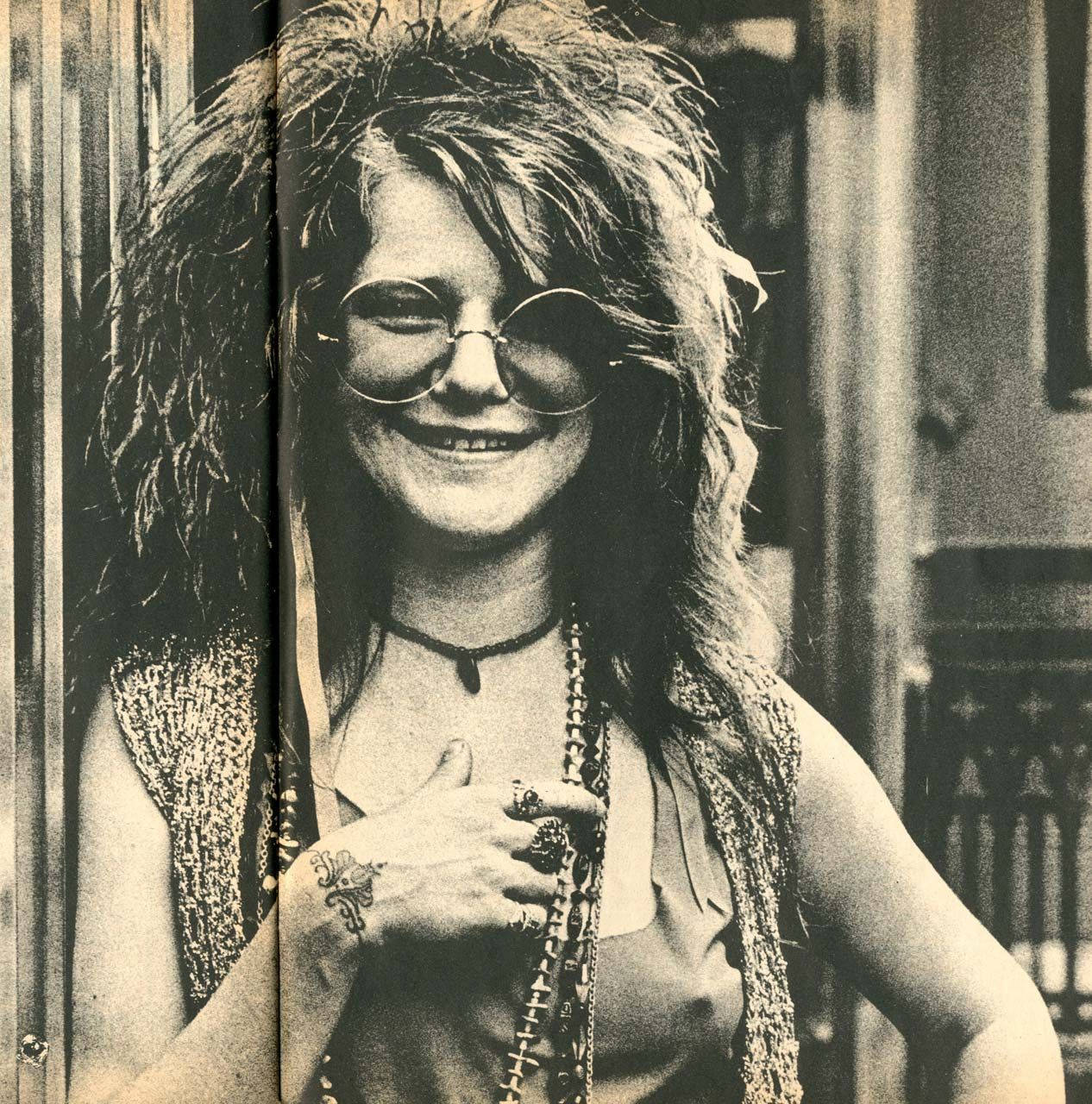 Classic Janis Joplin Rocking The Stage Background