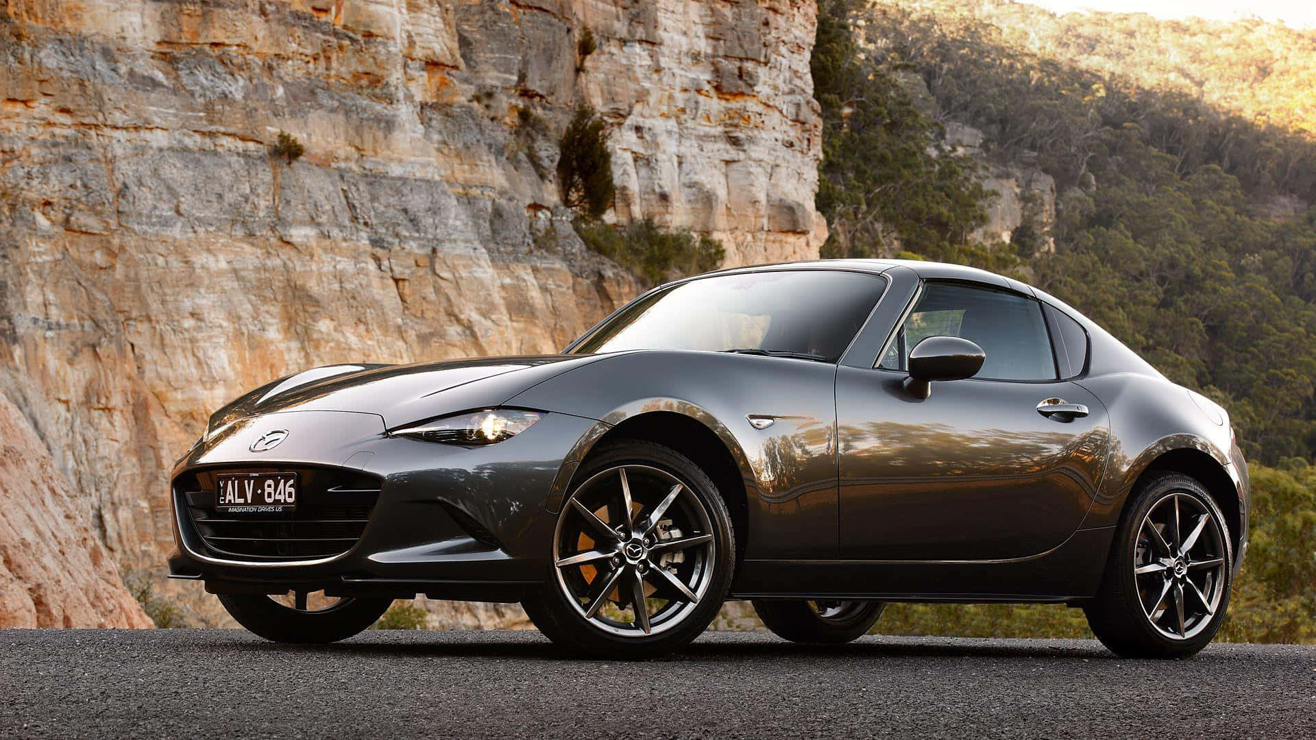 Classic Mazda Miata For The Road Background