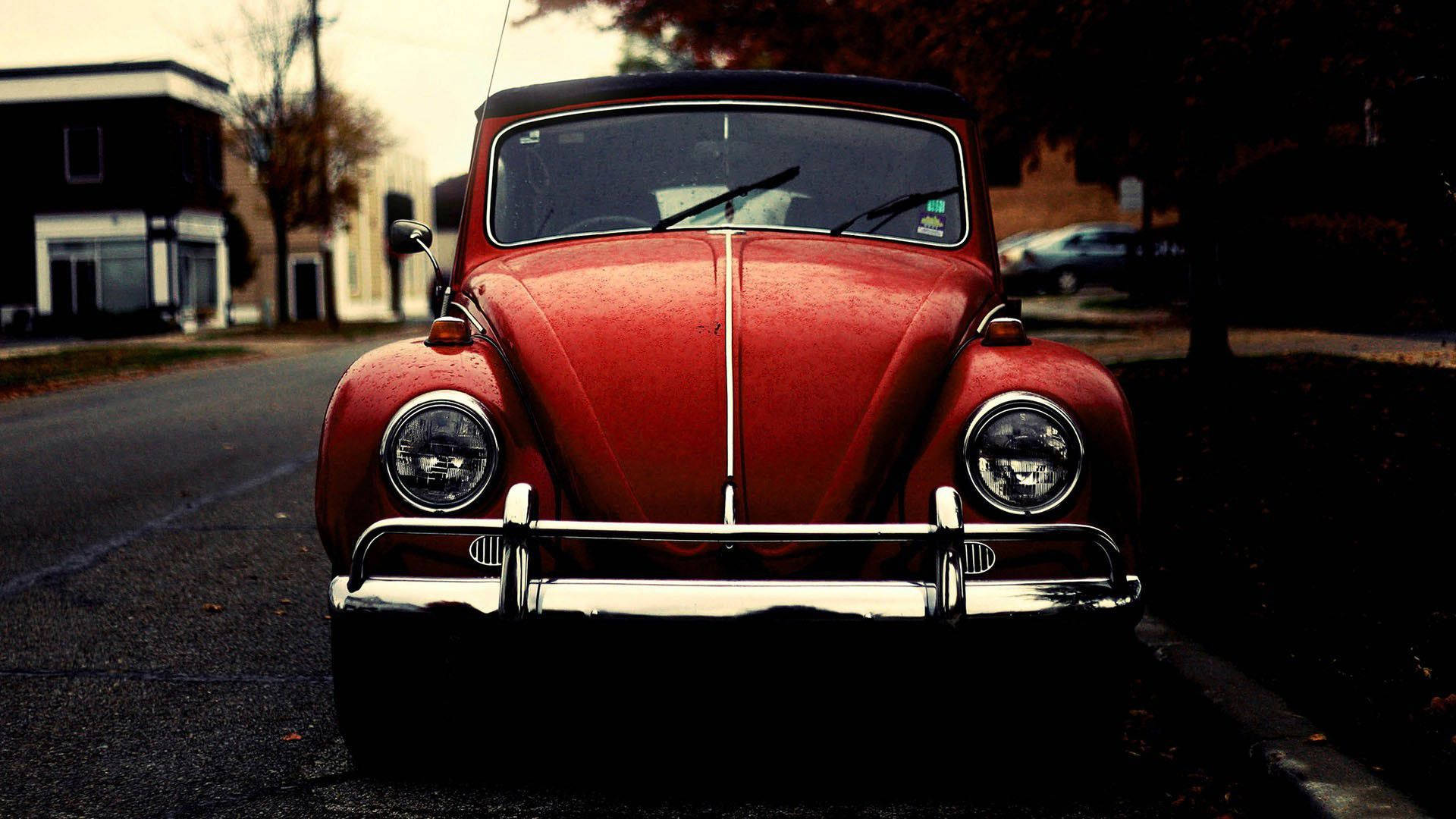 Classic Red Volkswagen Beetle Background