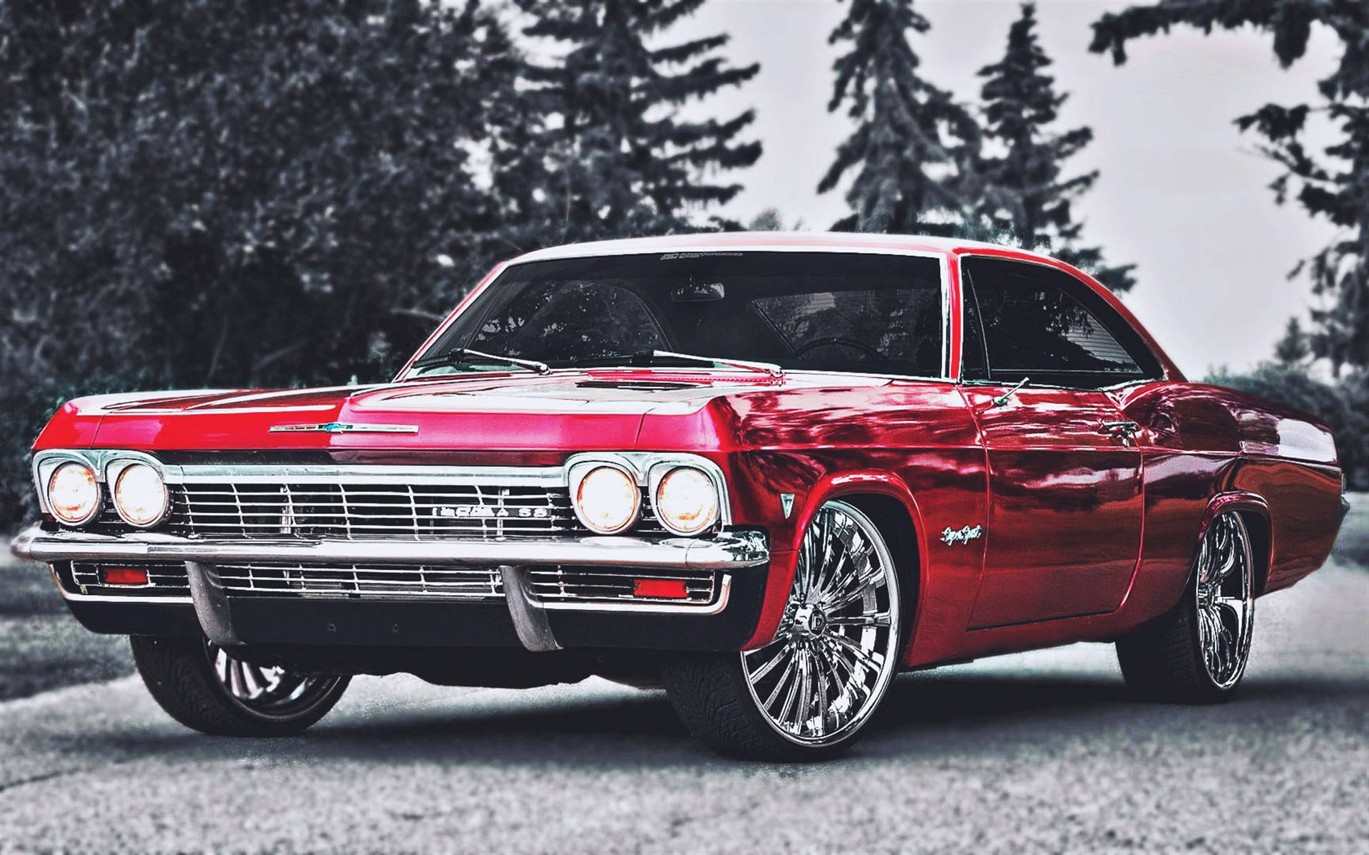 Classic Shine Of A 1967 Chevrolet Impala In Metallic Red