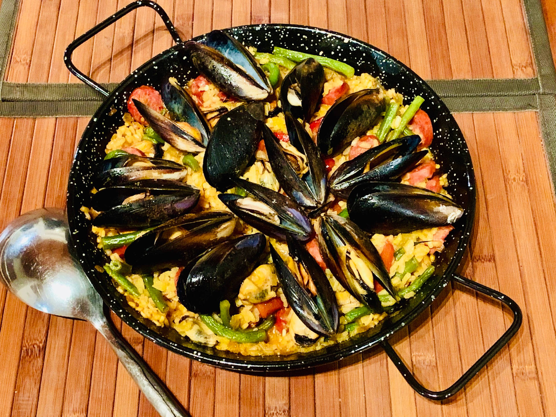 Classic Spanish Paella Dish In Natural Setting