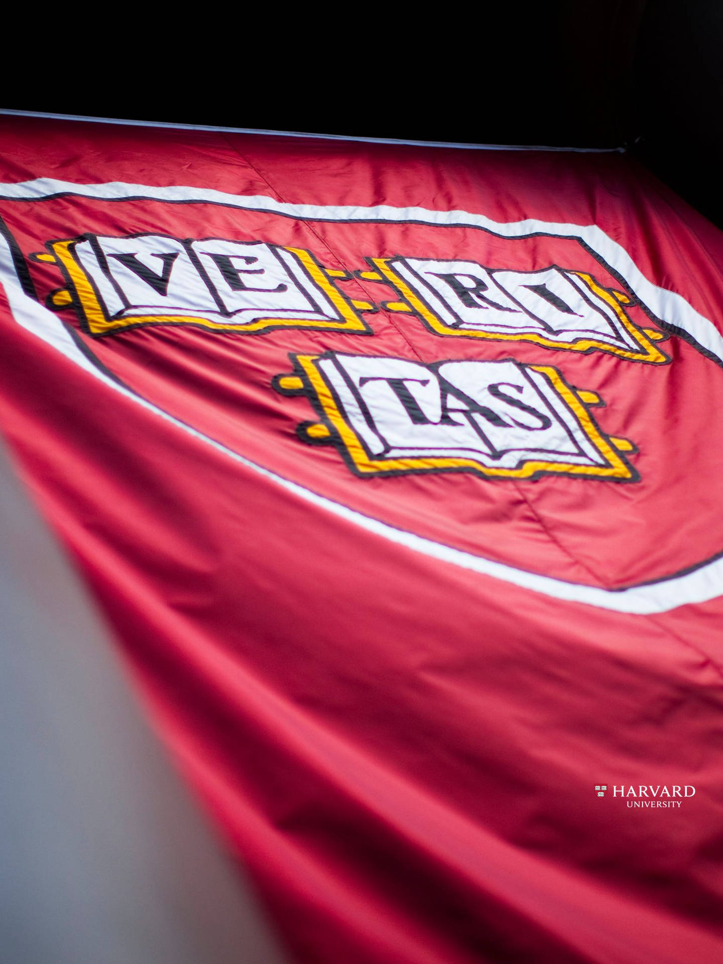 Classic View Of Harvard University Red Motto Background