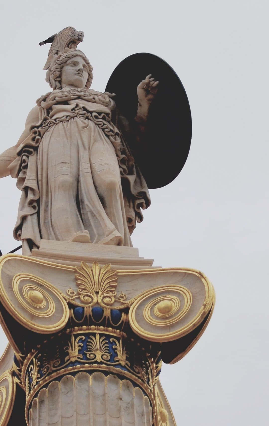 Classical Statue With Shield And Plume Background