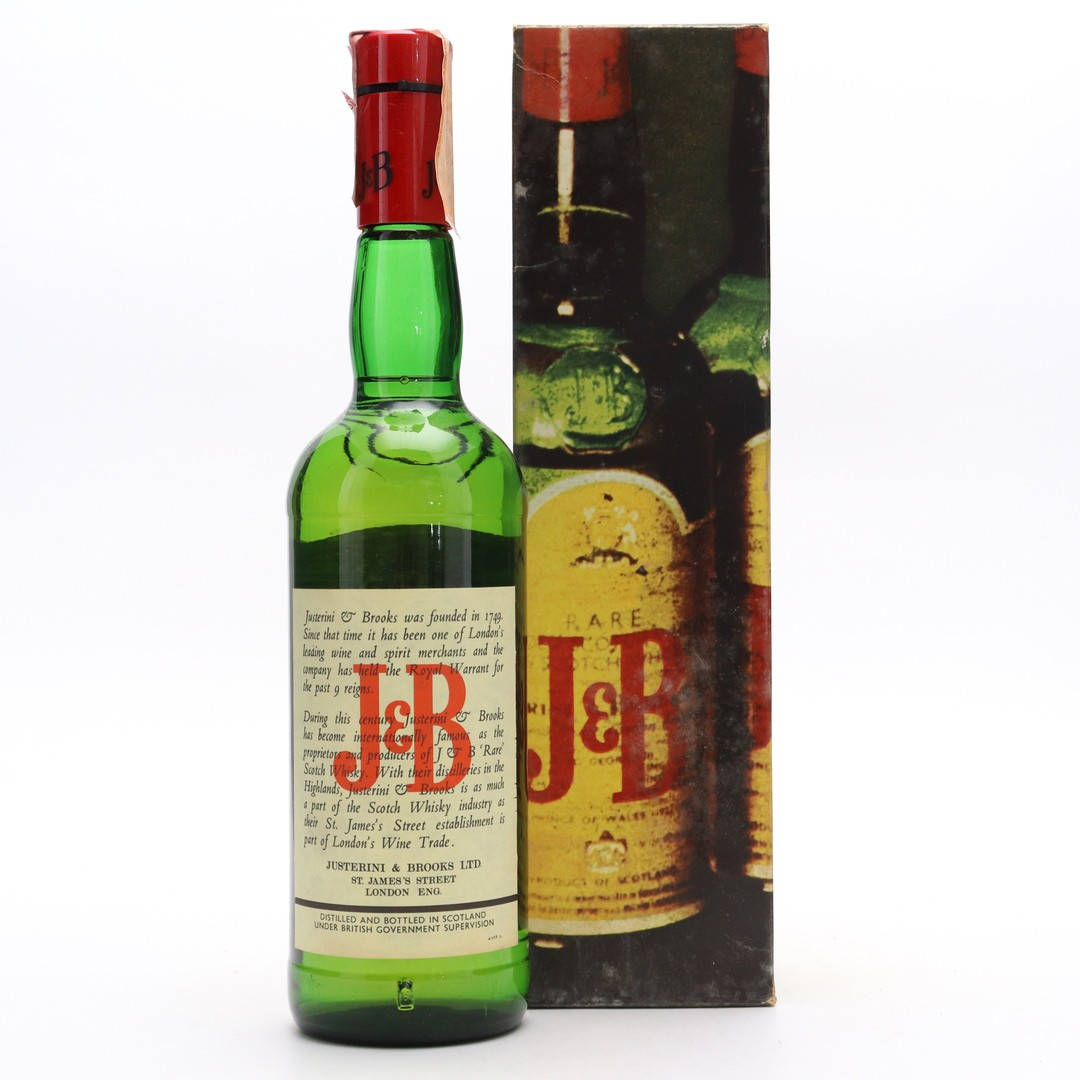 Classy Bottles Of J&b Whisky Background