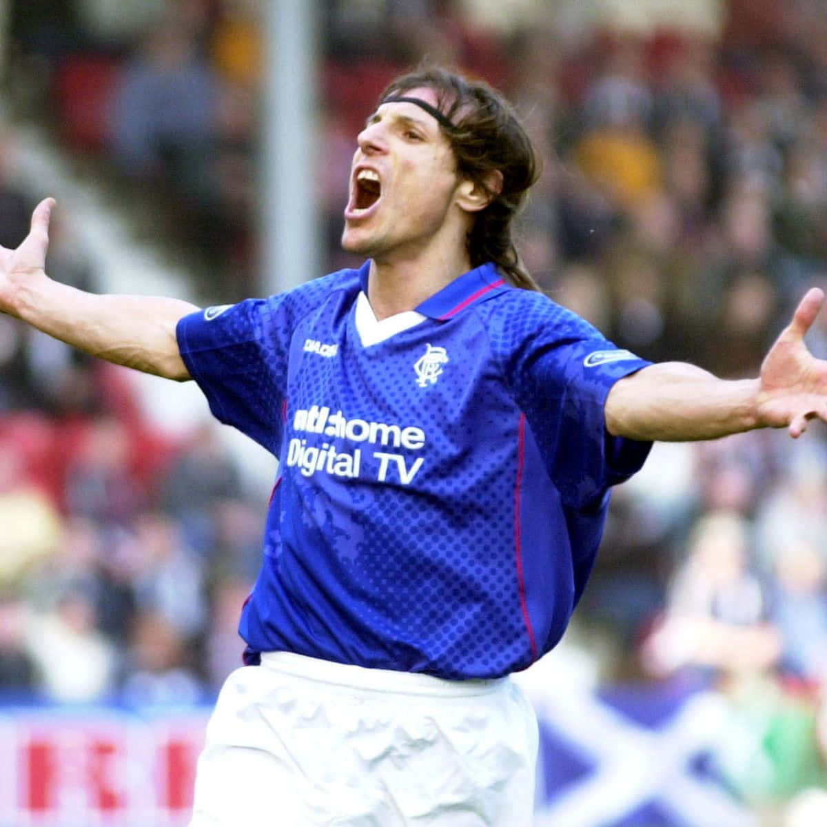Claudio Caniggia In Ragers Fc Jersey Background