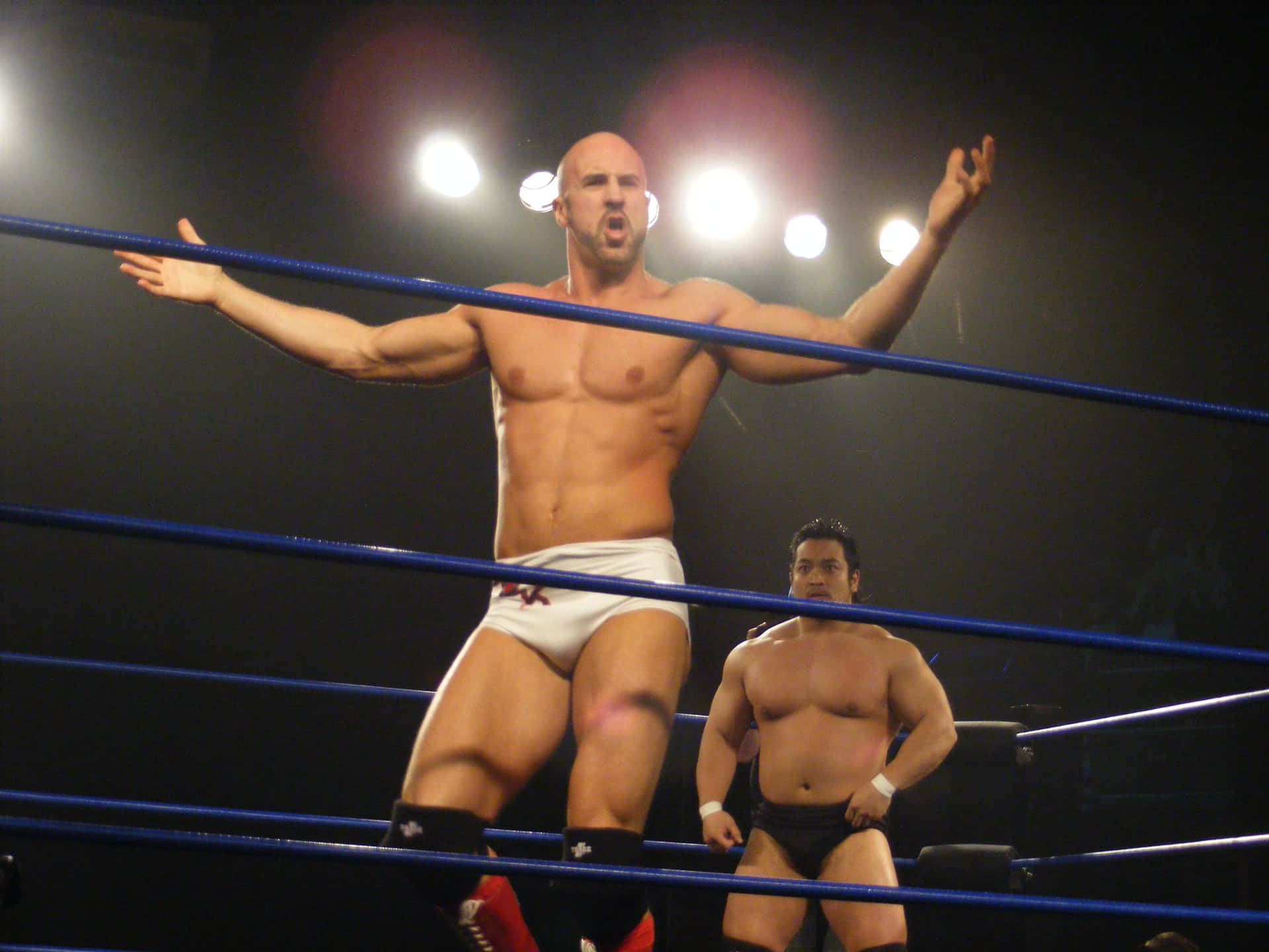 Claudio Castagnoli In Action At Chikara's King Of Trios Night 3 Background