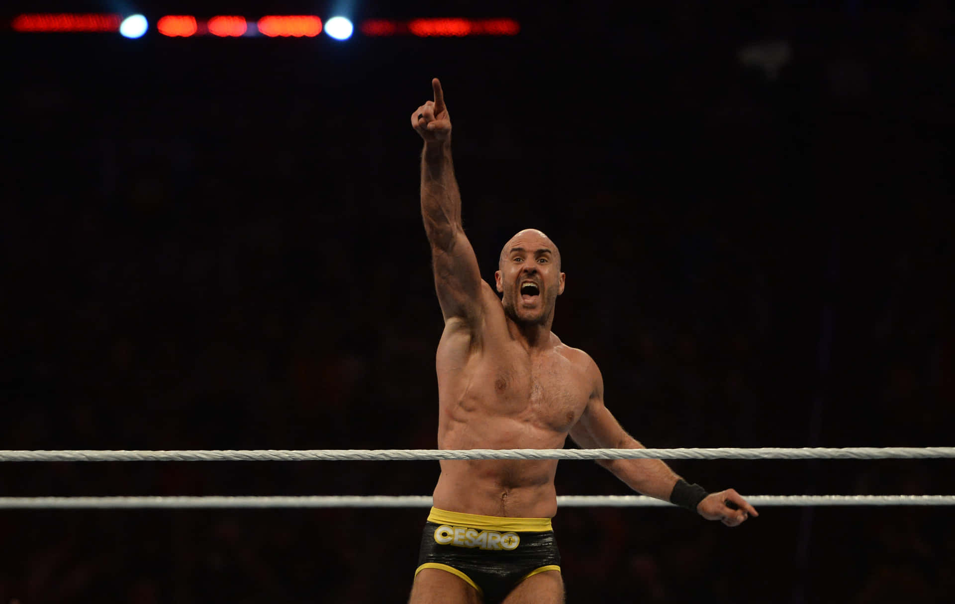 Claudio Castagnoli Pointing Up Wrestlemania 37 Background