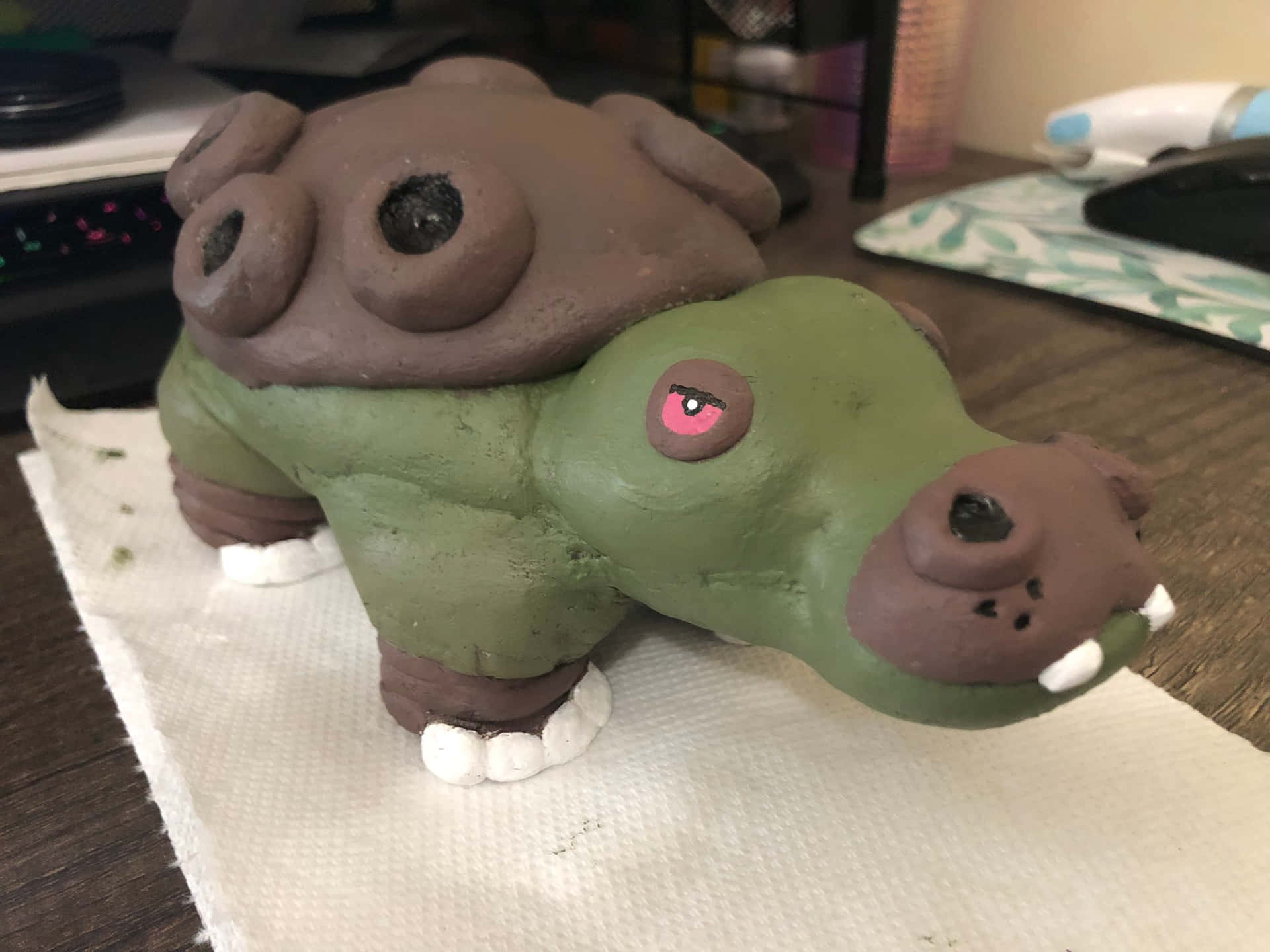 Clay Figure Of Hippowdon Background