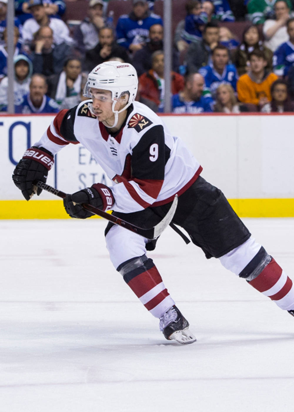 Clayton Keller Chasing Hockey Puck